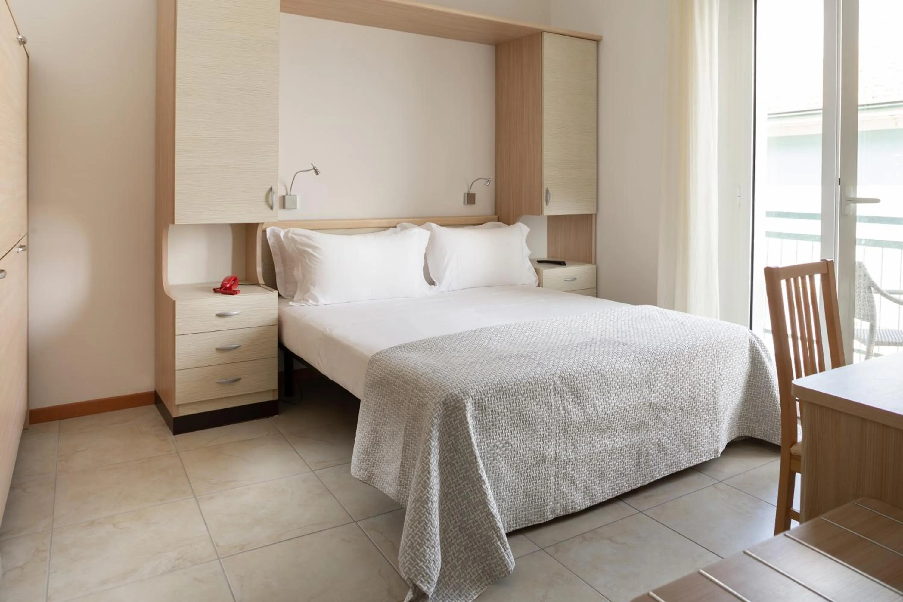 Bed in Hotel Riviera