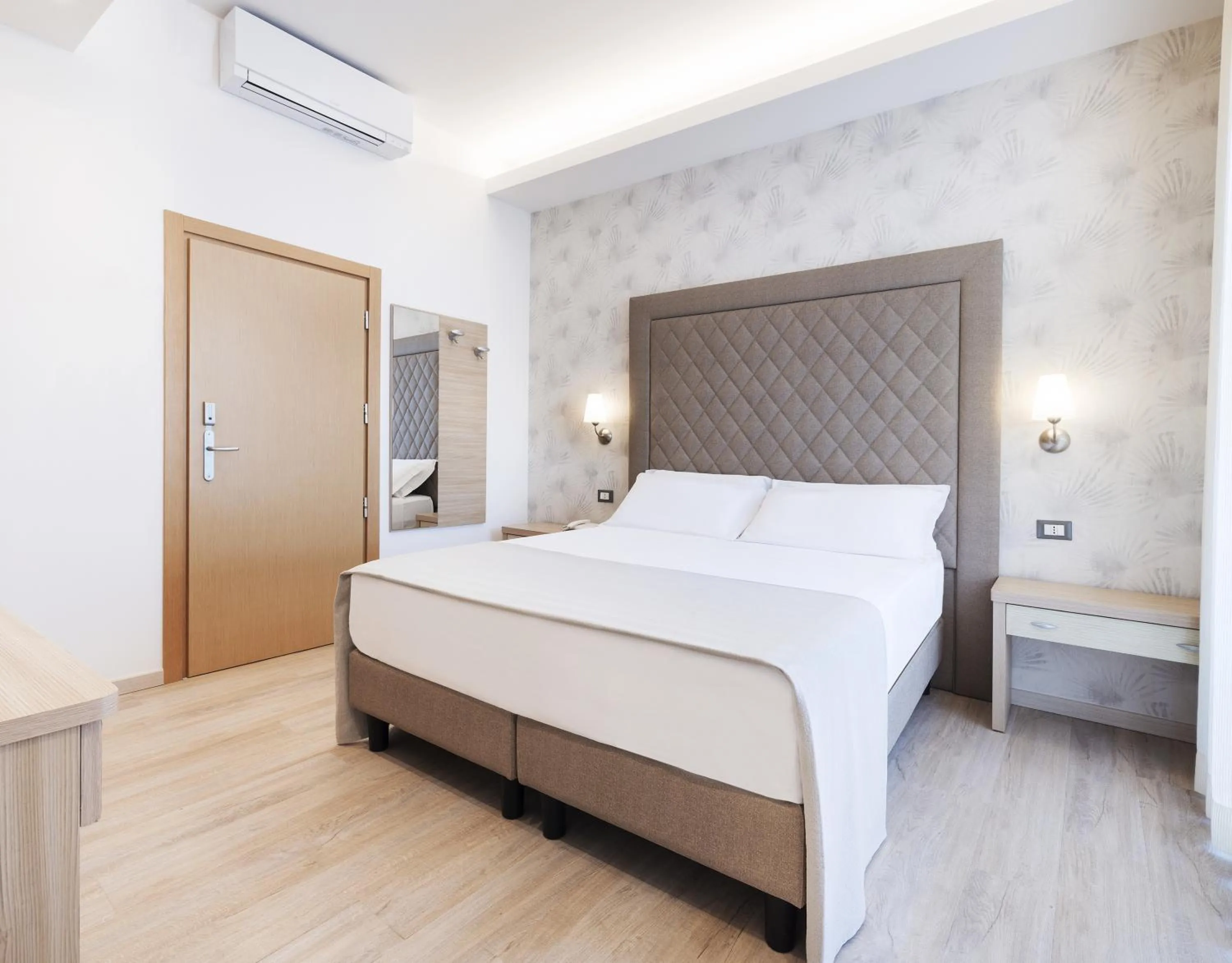 Bed in Hotel Riviera