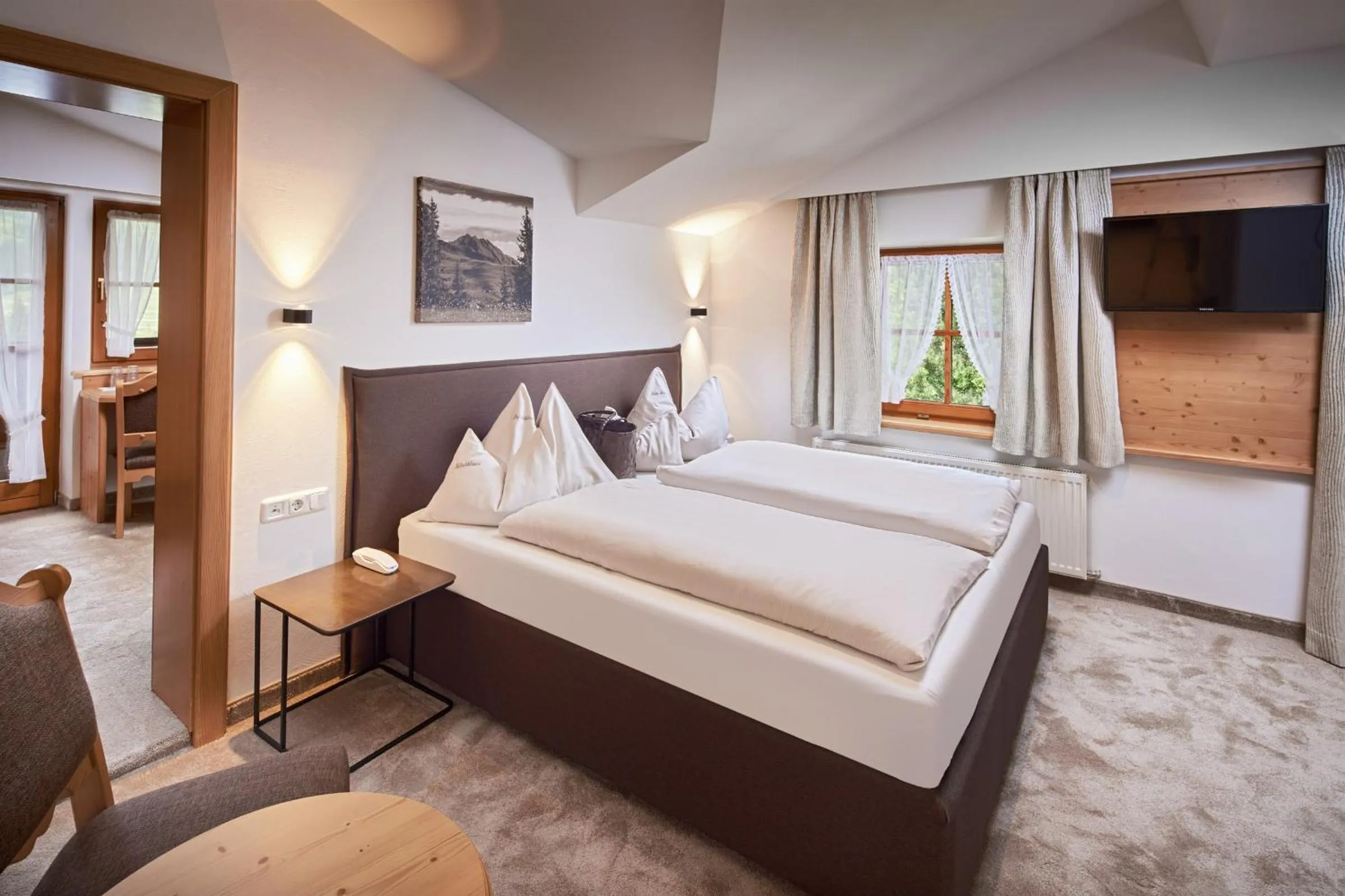 Bed in Habachklause Familien Bauernhof Resort