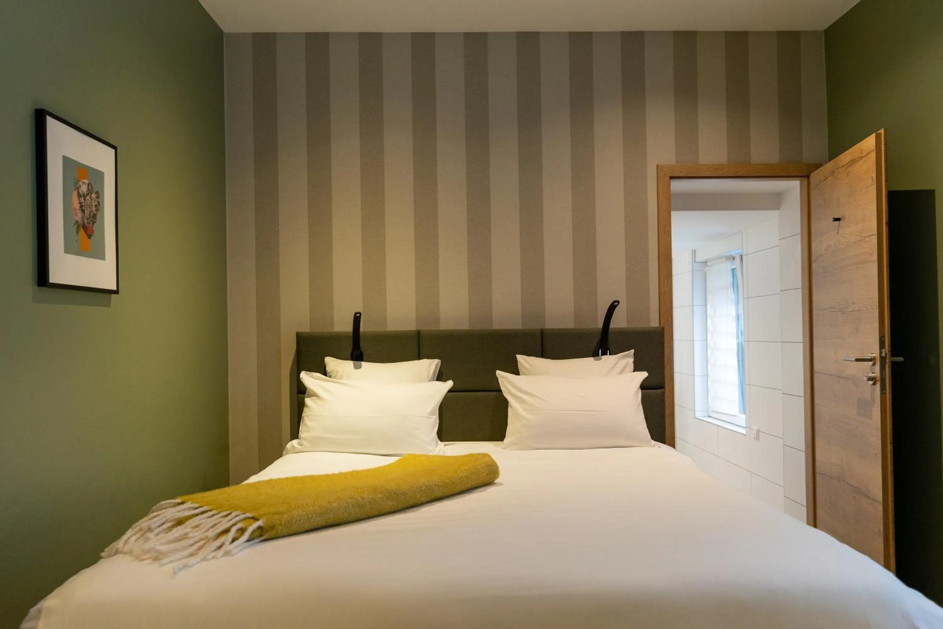 Bed in Hostellerie du Grünewald