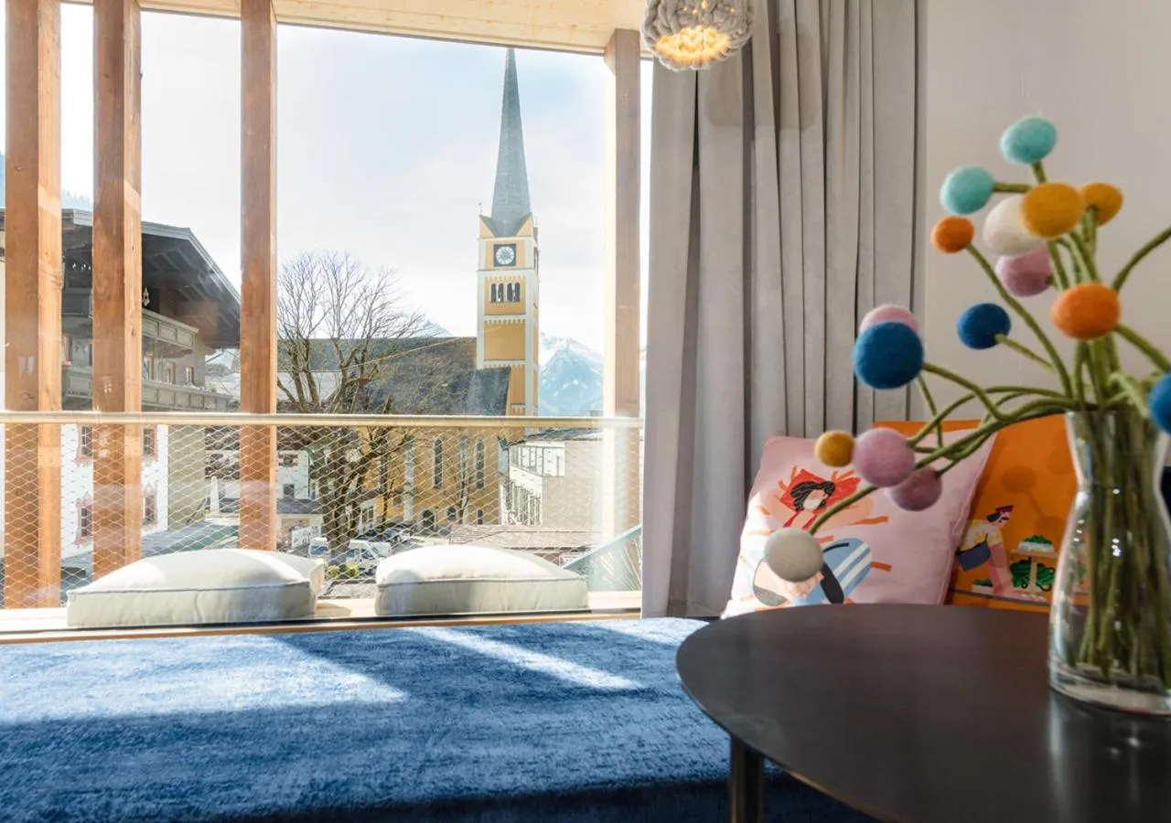 Seating area, Bed in Hotel Blü Gastein