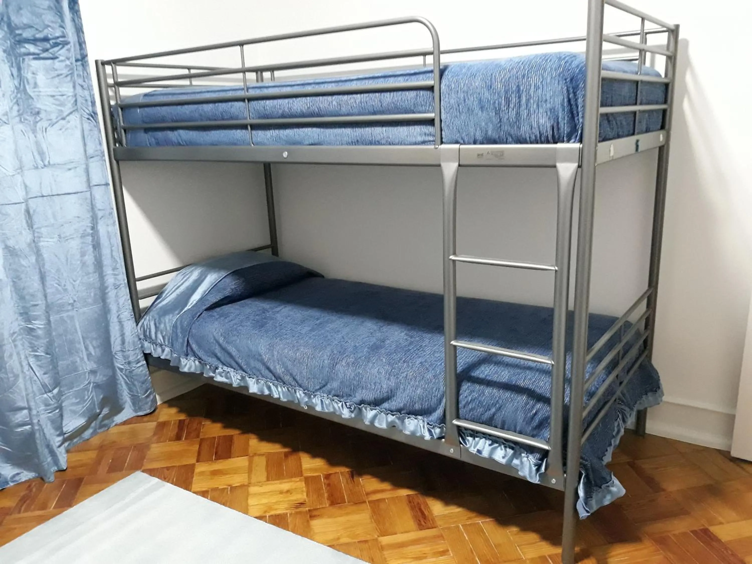 Bed in Ameli Rooms