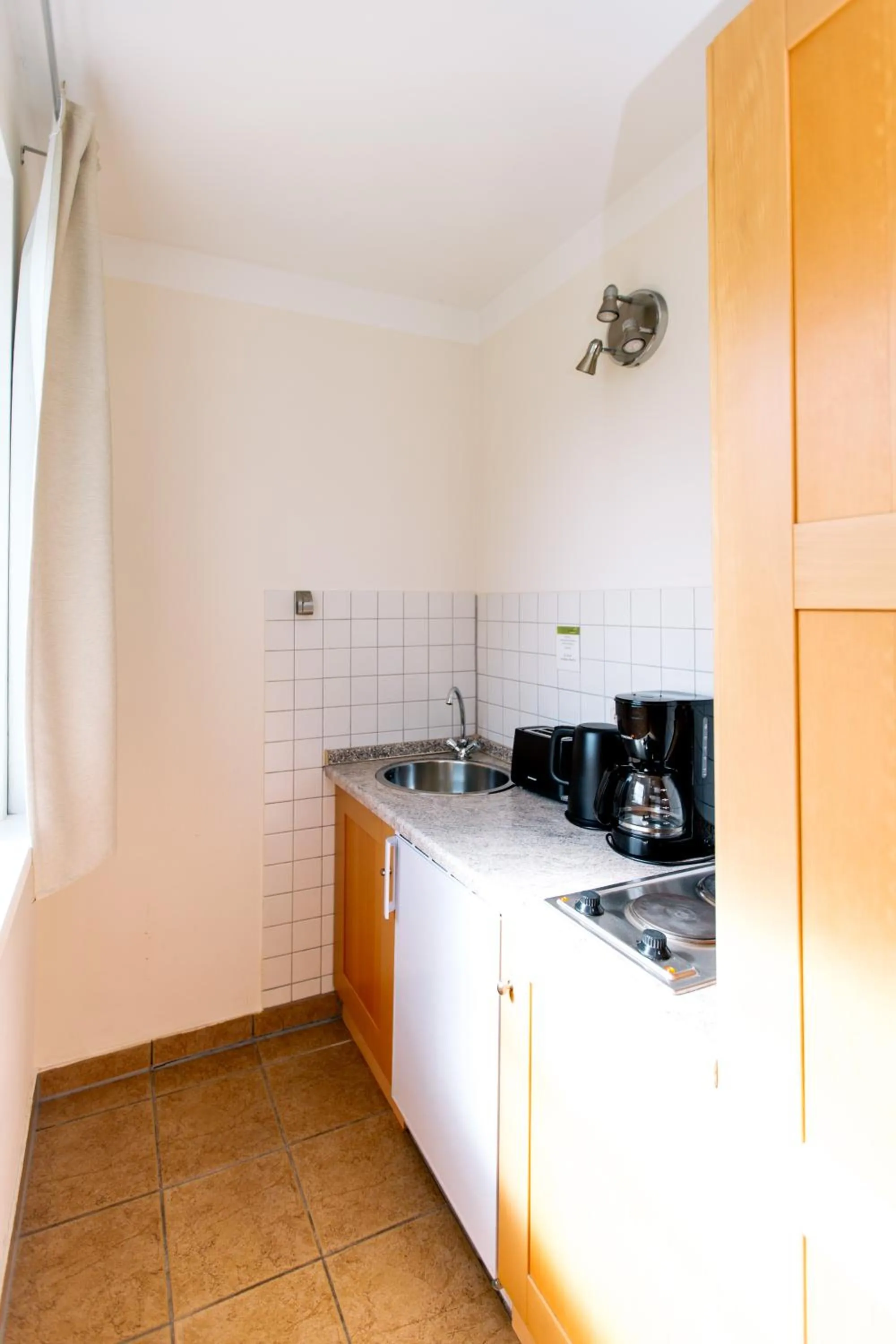 Kitchen or kitchenette in FerienResidenz MüritzPark