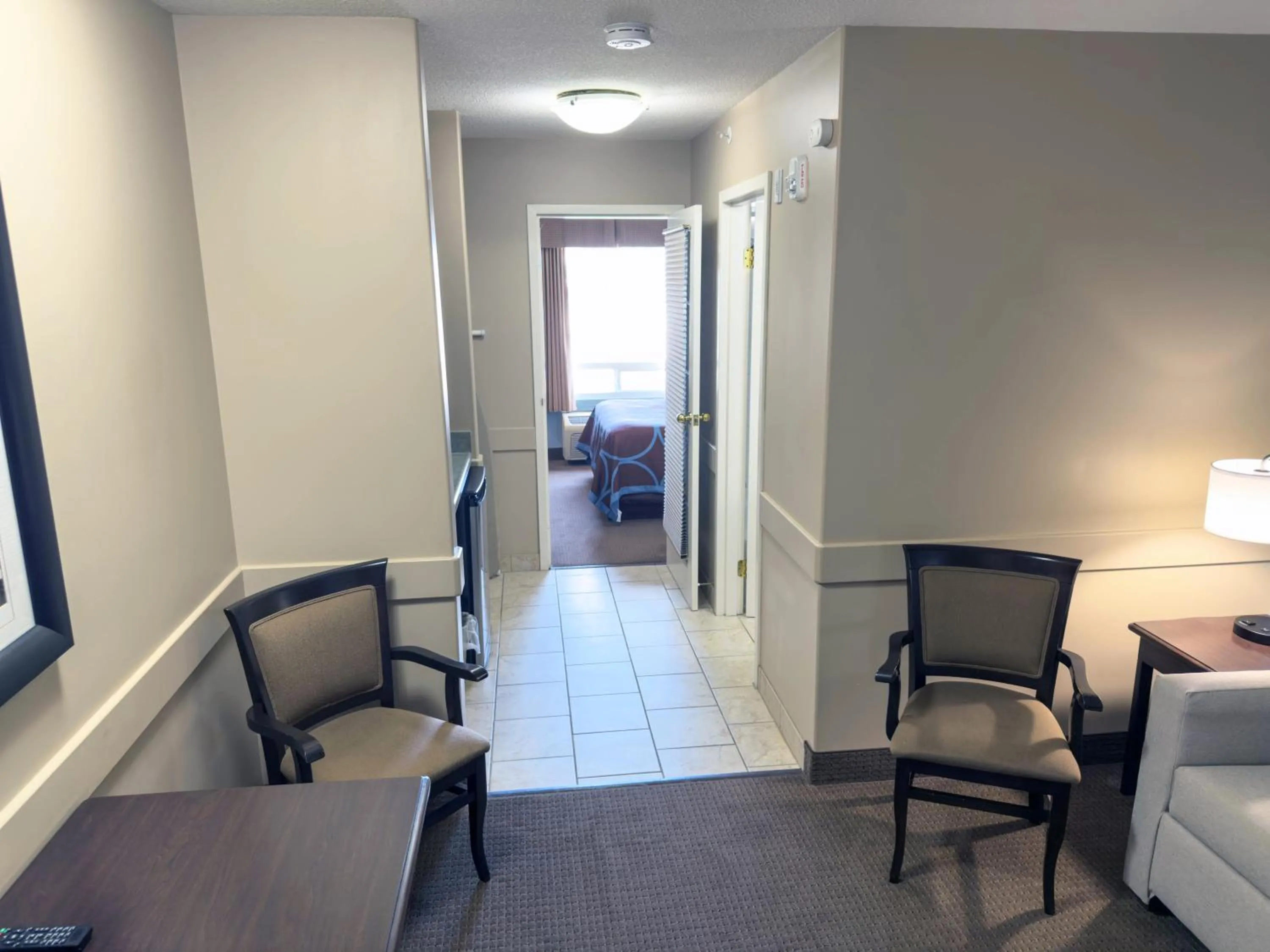 Living room in Super 8 by Wyndham Edmonton South