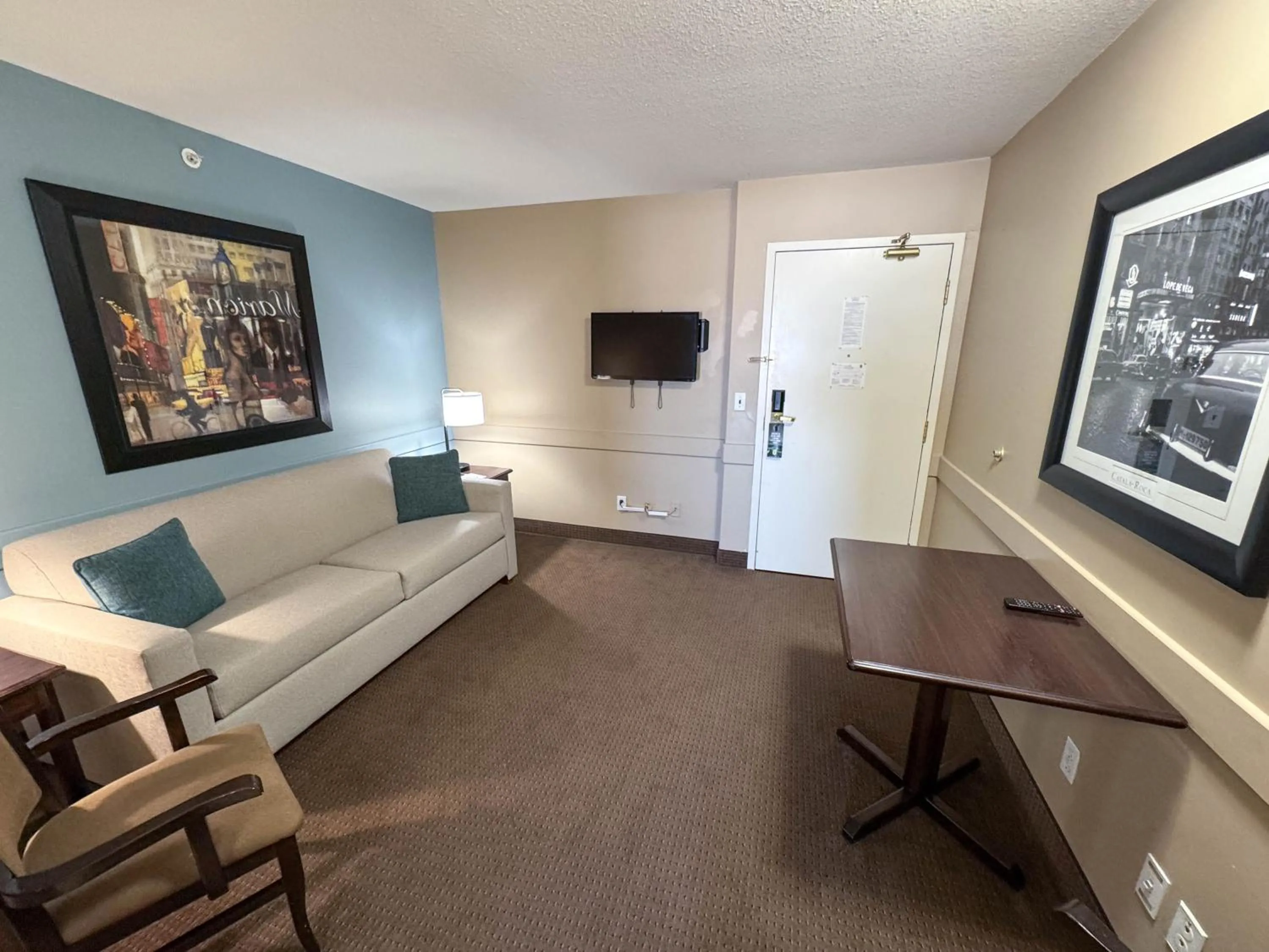 Living room in Super 8 by Wyndham Edmonton South