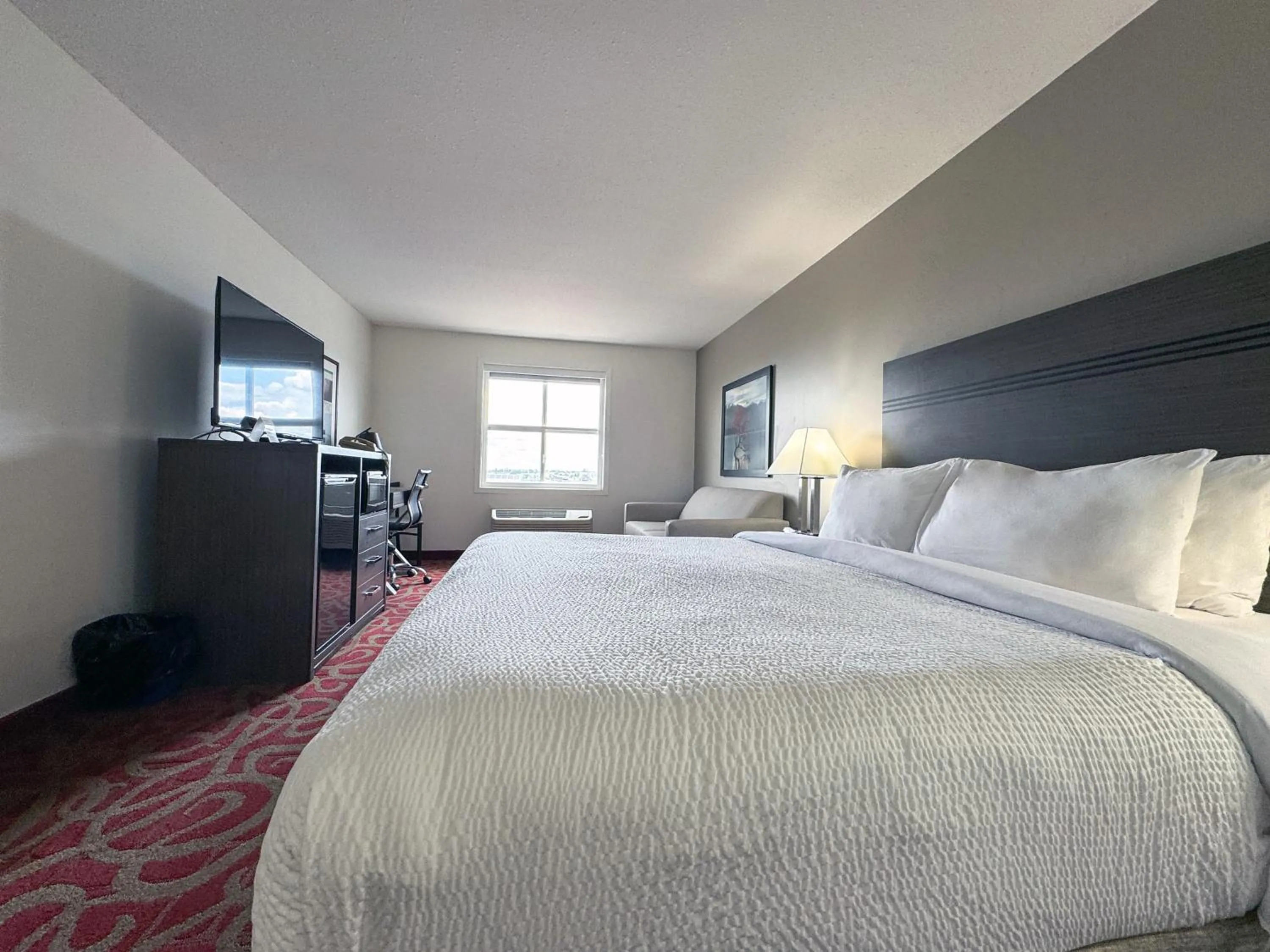 Bed in Ramada by Wyndham Sherwood Park