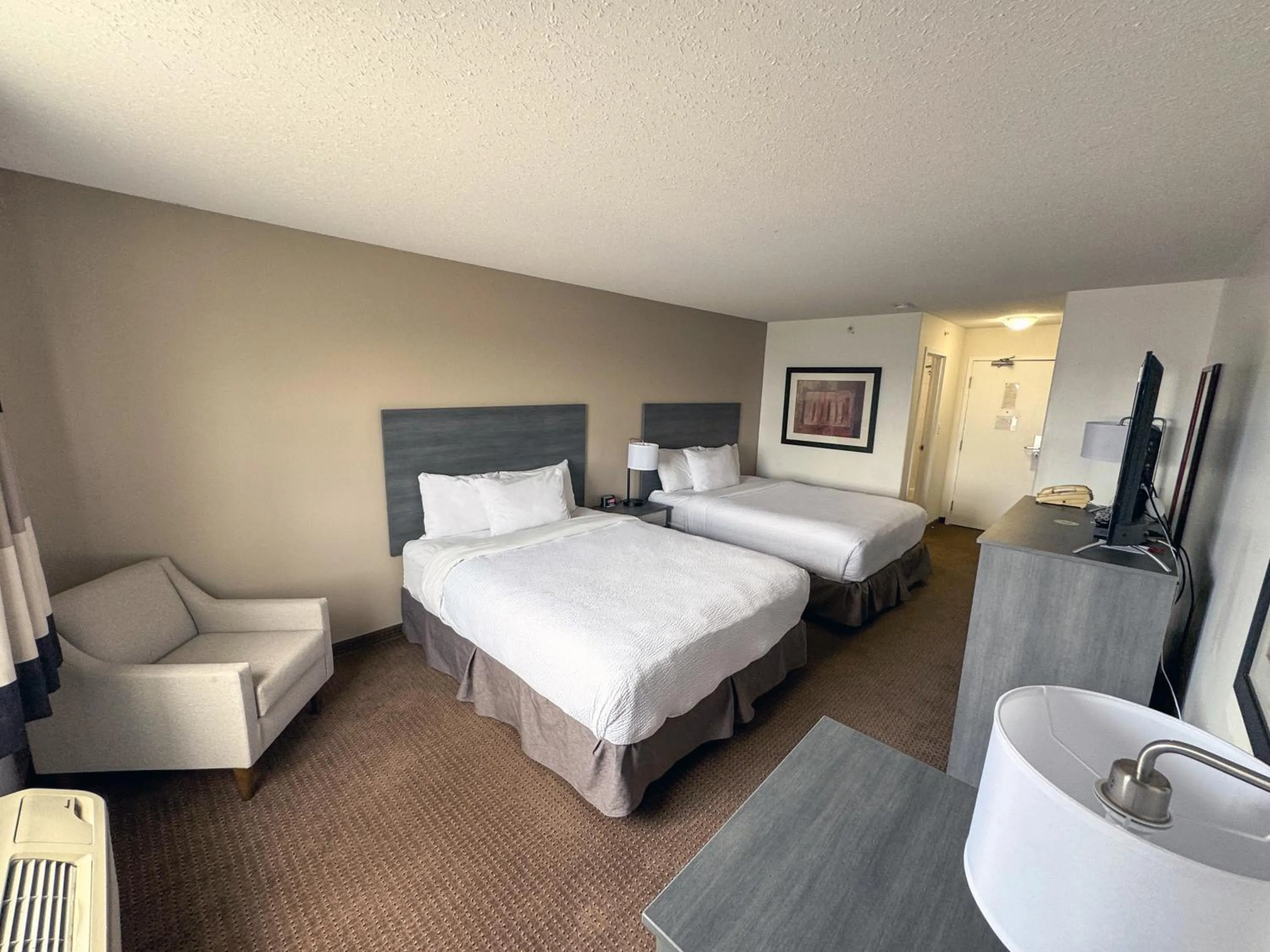 Bed in Ramada by Wyndham Sherwood Park