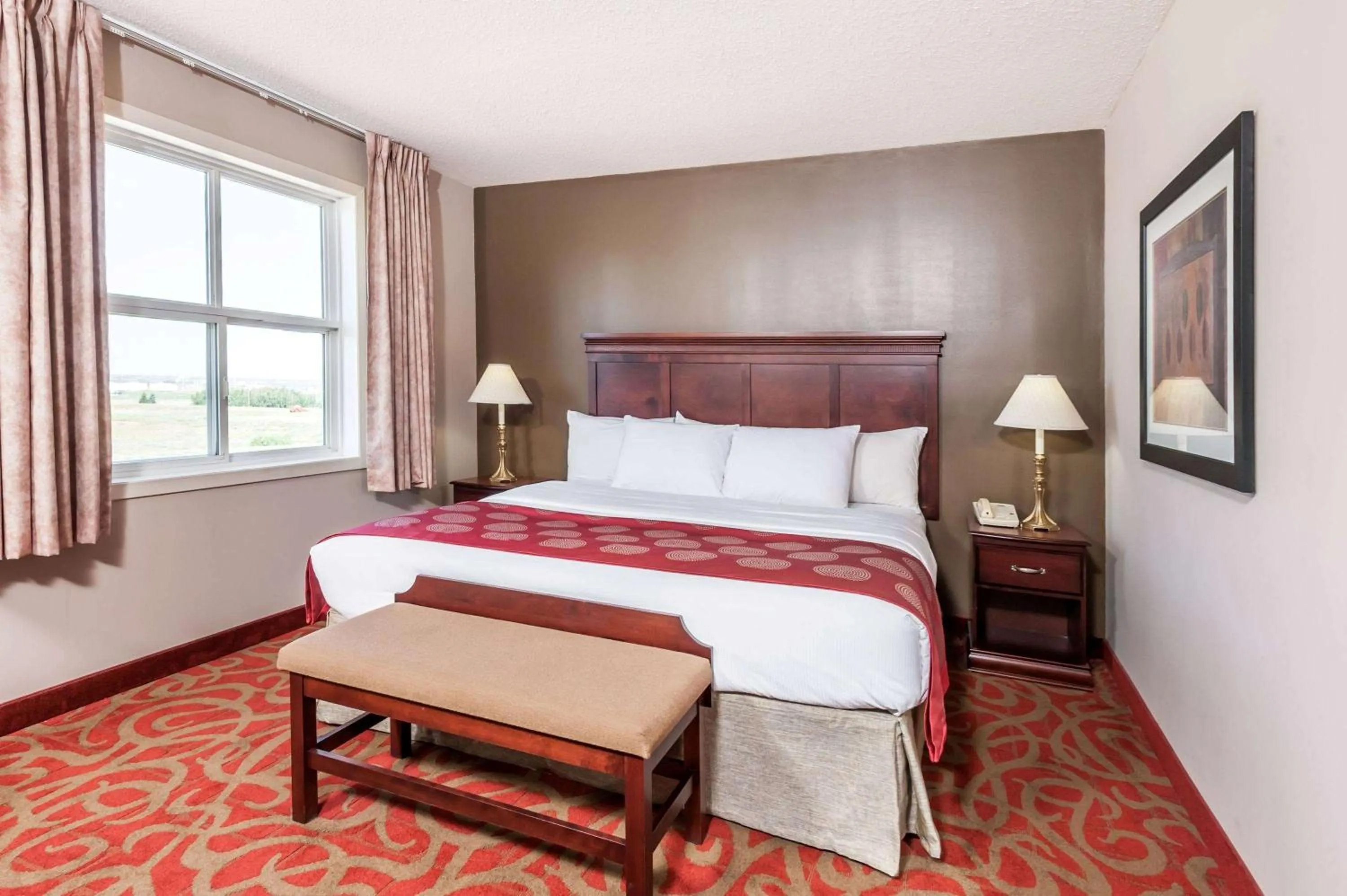 Photo of the whole room, Bed in Ramada by Wyndham Sherwood Park