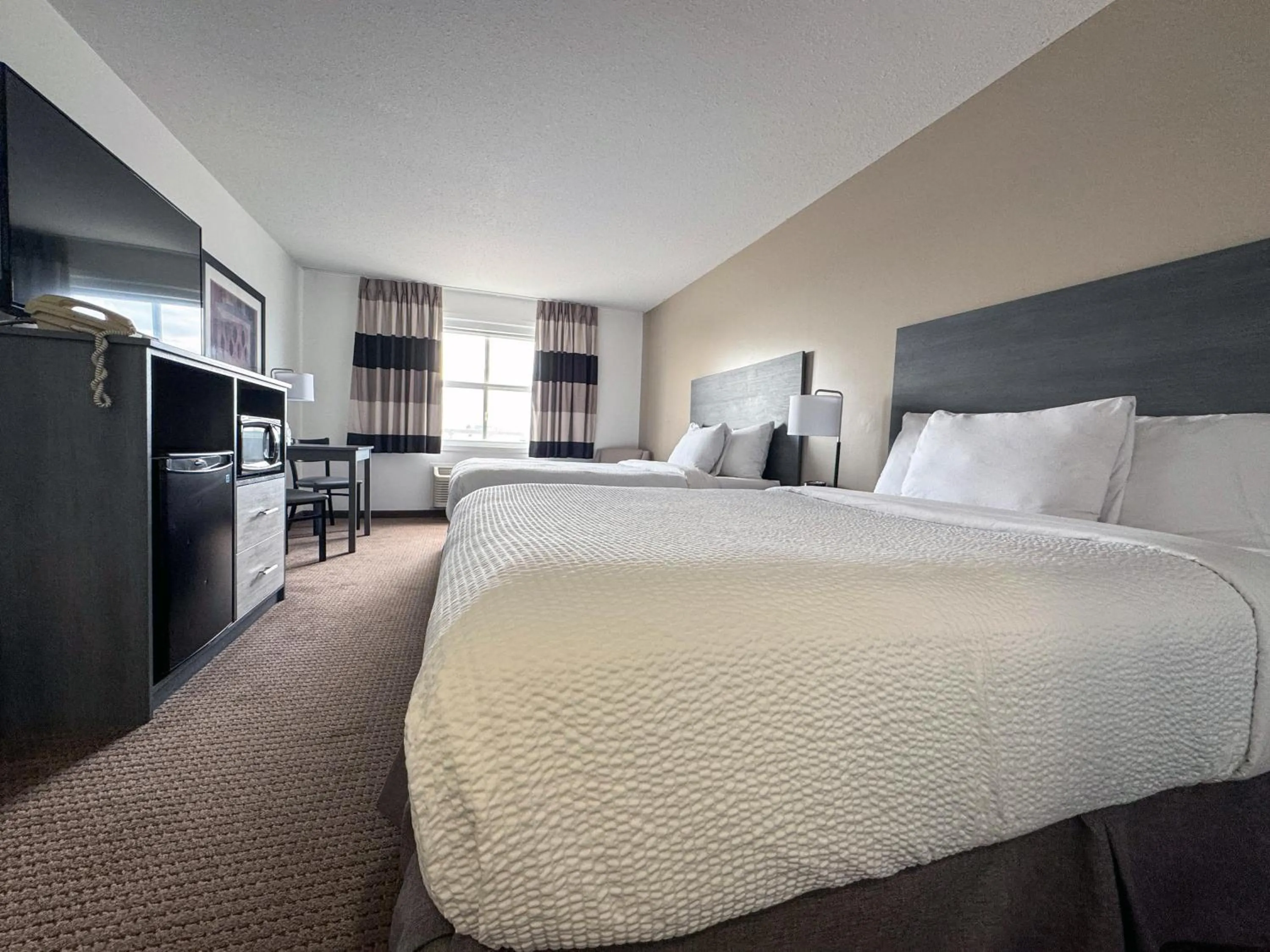 Bed in Ramada by Wyndham Sherwood Park