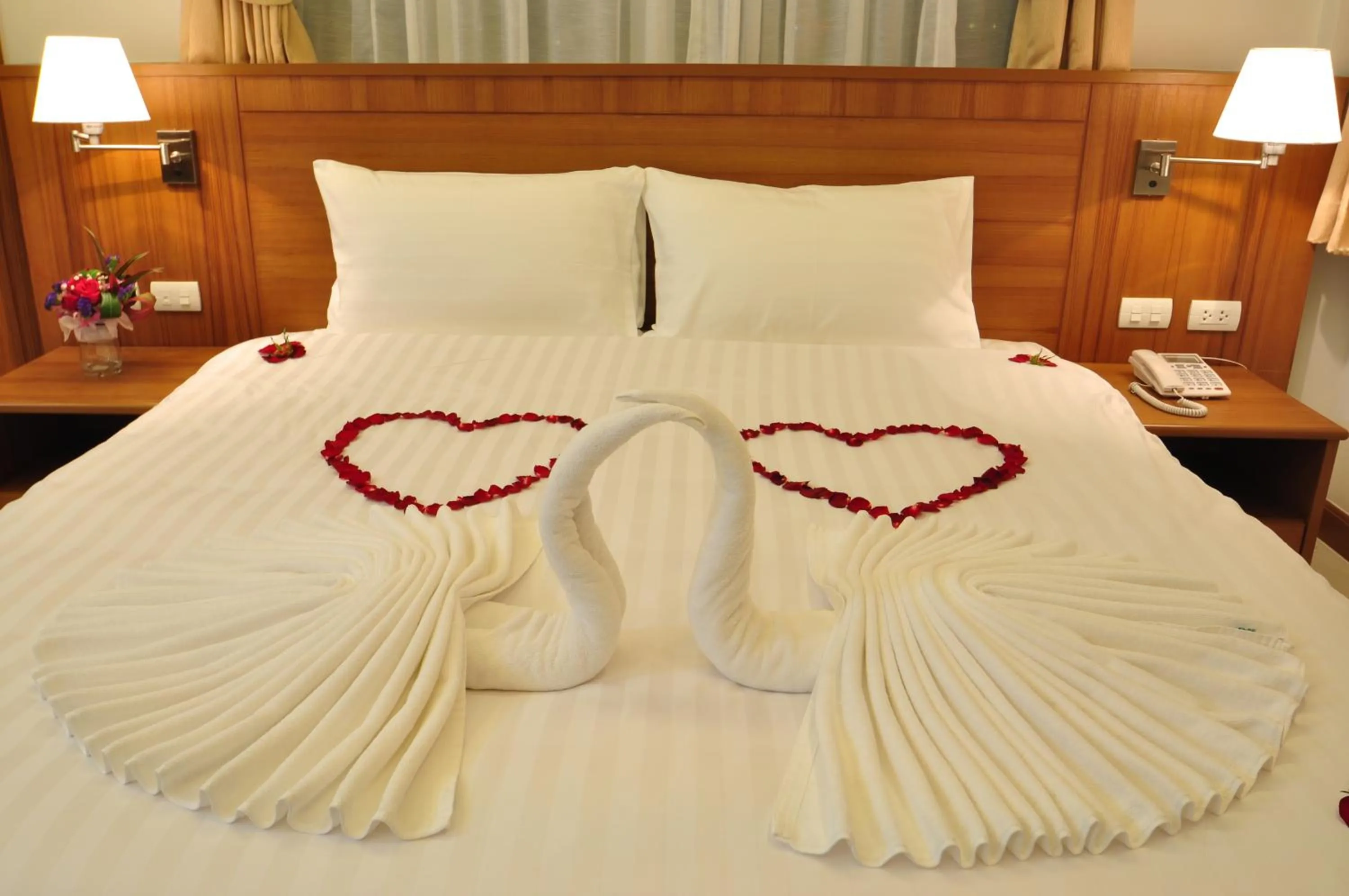 Bedroom, Bed in Green Harbor Hotel & Service Apartment