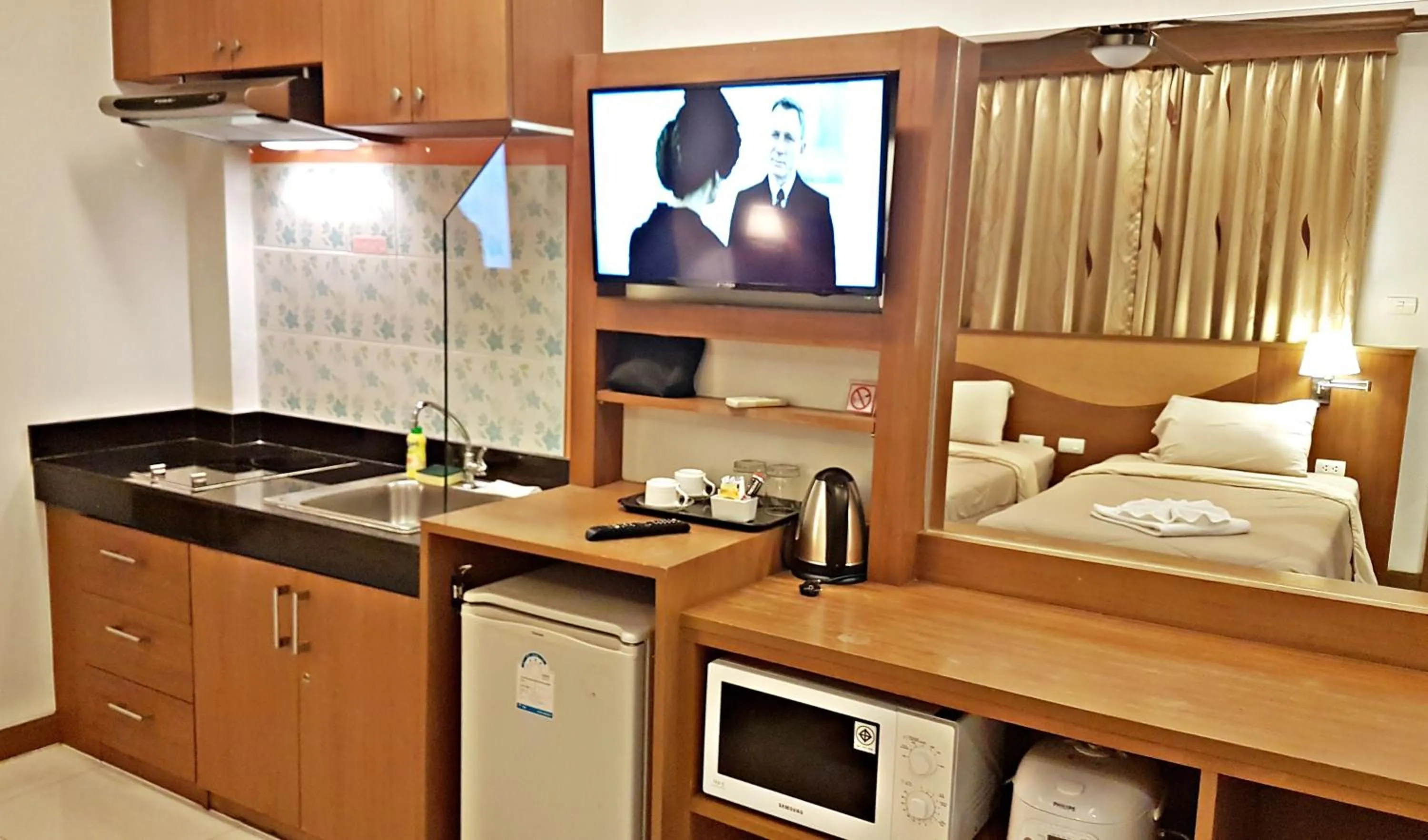 Bed in Green Harbor Hotel & Service Apartment