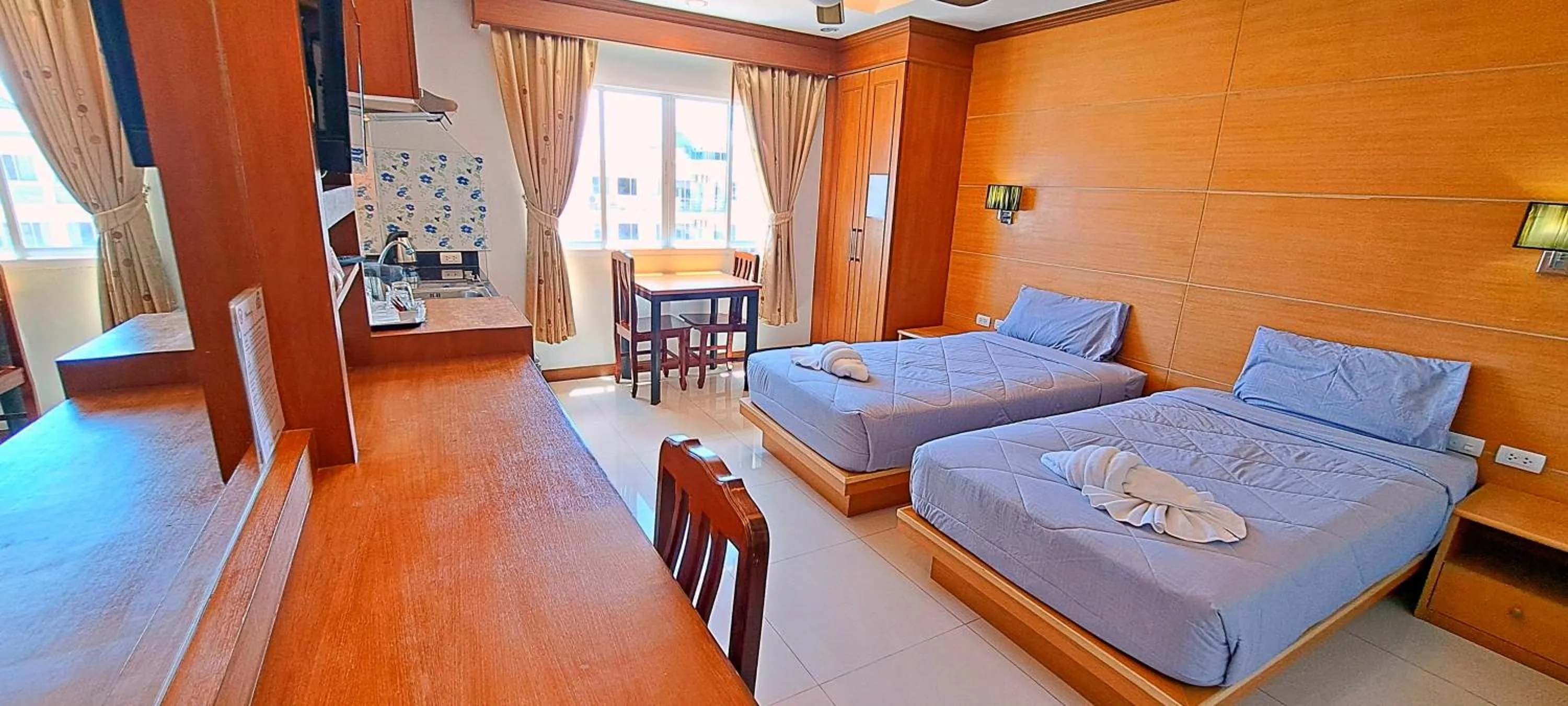 Photo of the whole room, Bed in Green Harbor Hotel & Service Apartment