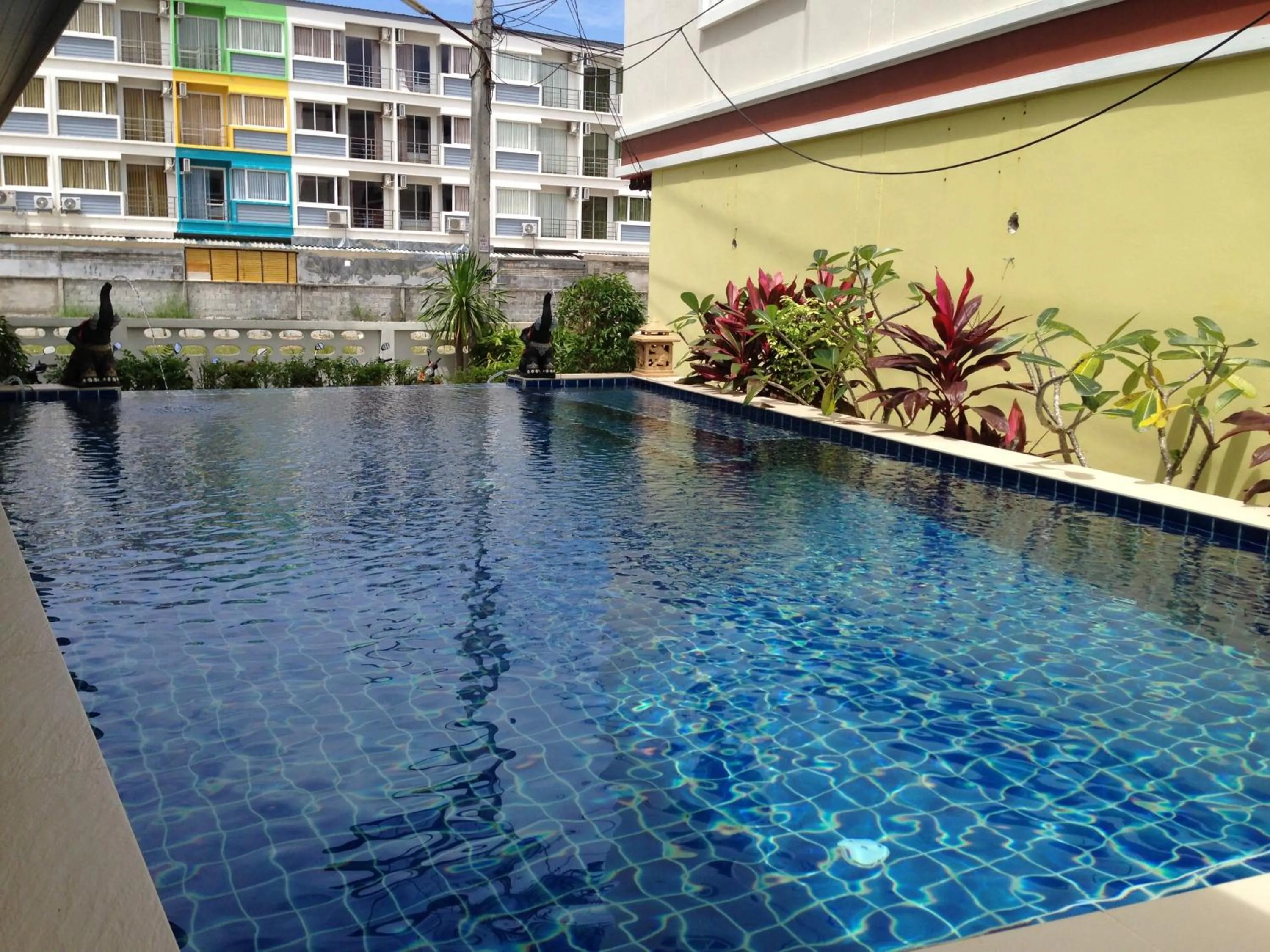 Swimming pool in Green Harbor Hotel & Service Apartment