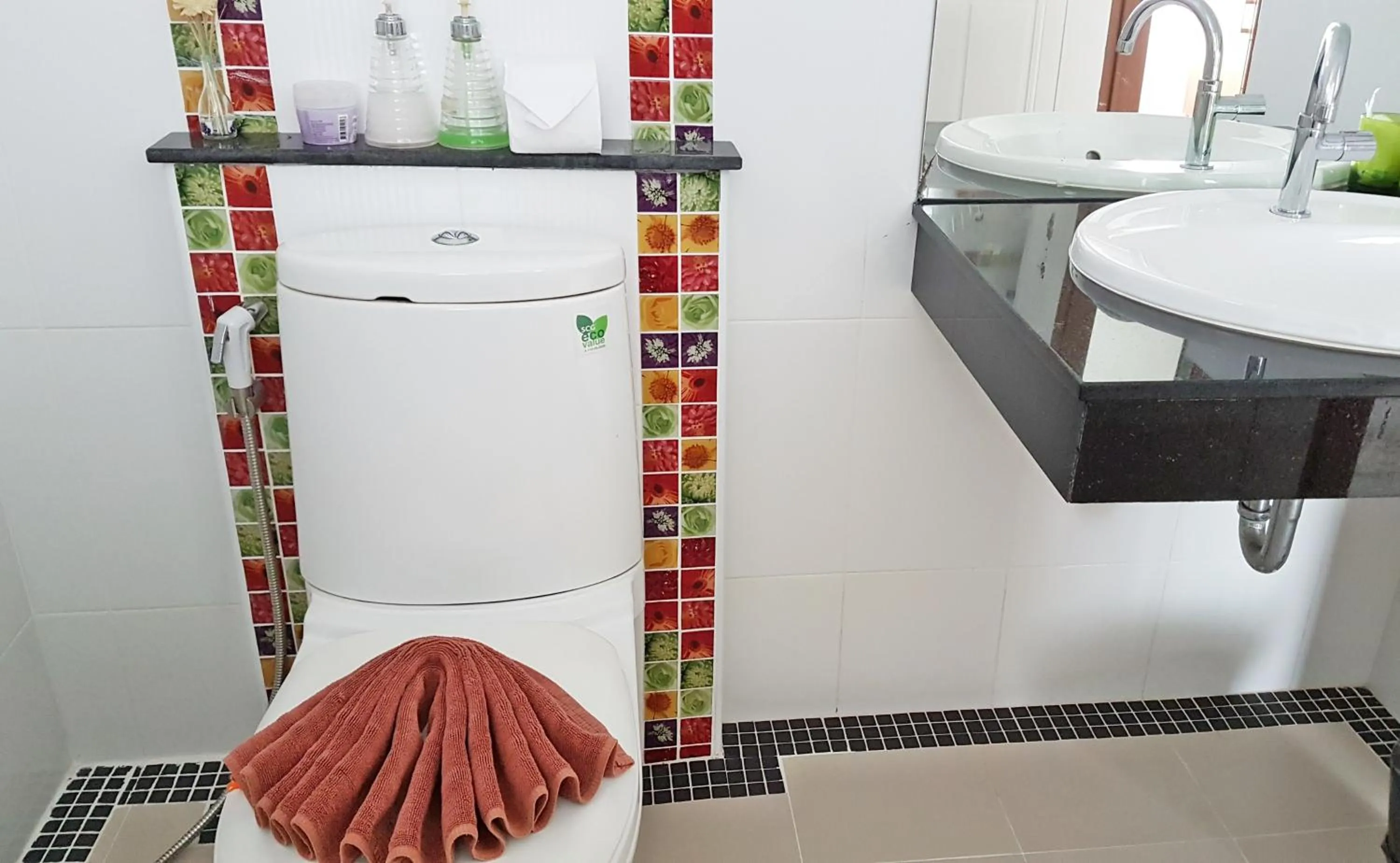 Toilet in Green Harbor Hotel & Service Apartment