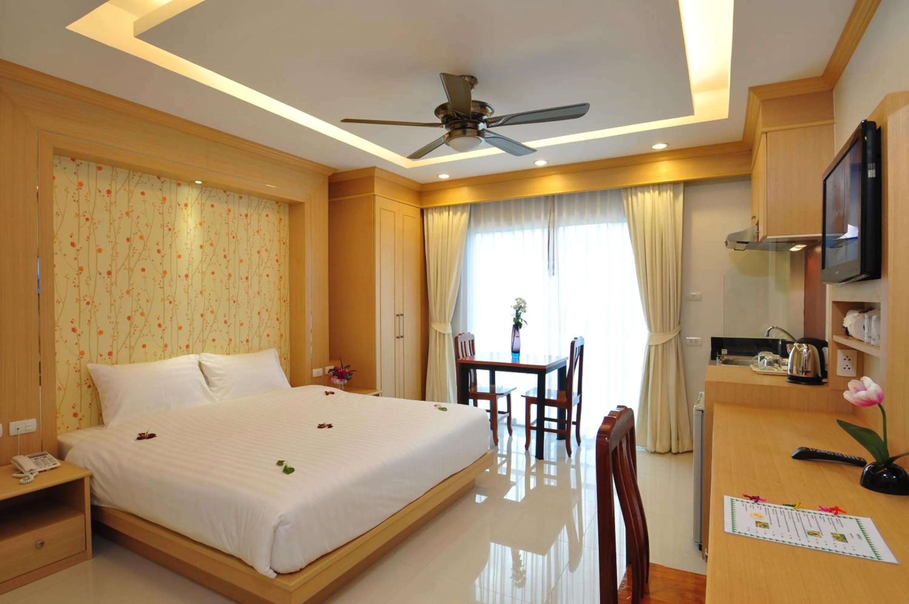 Bedroom, Bed in Green Harbor Hotel & Service Apartment