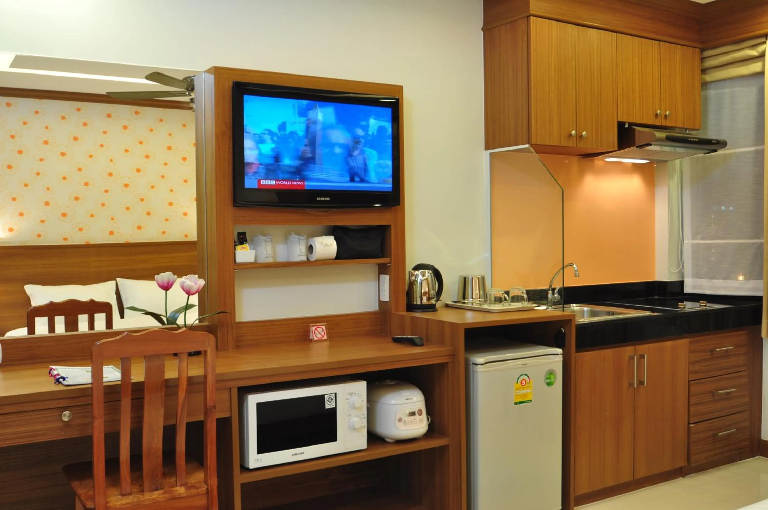 Kitchen or kitchenette in Green Harbor Hotel & Service Apartment