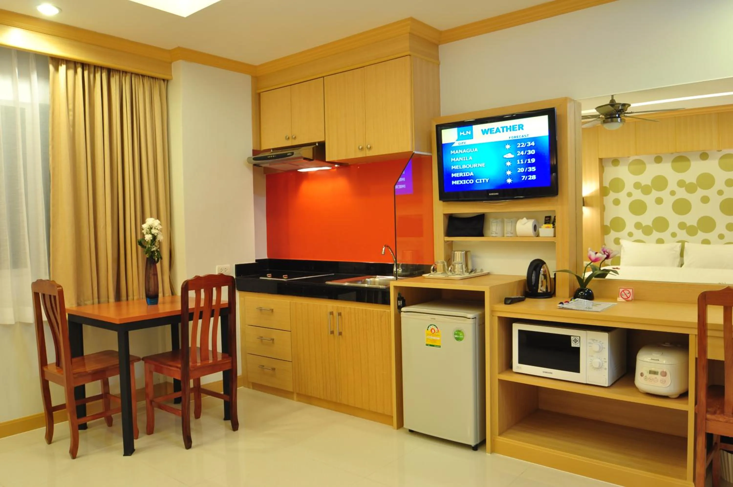 Kitchen or kitchenette in Green Harbor Hotel & Service Apartment