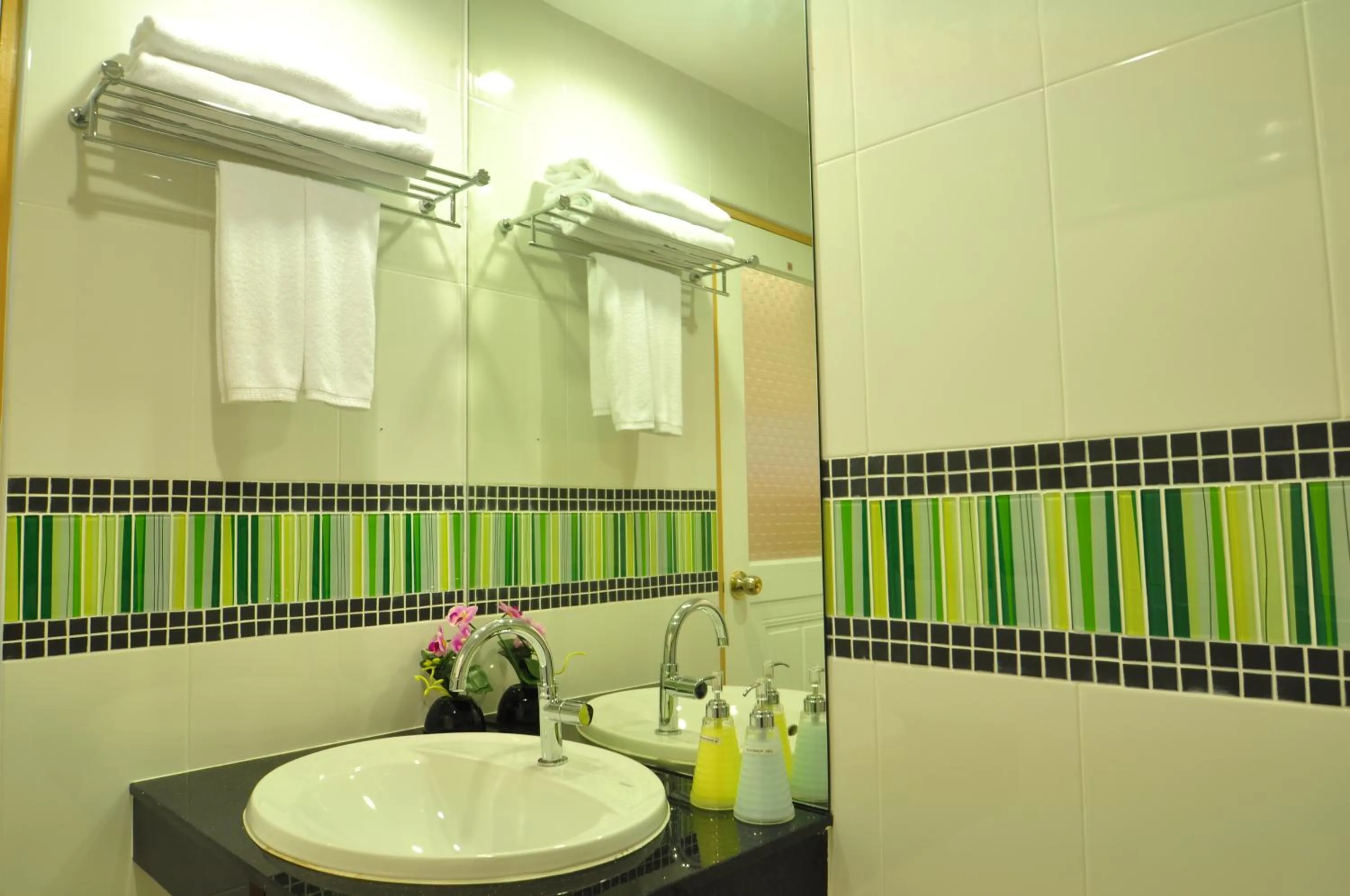 Bathroom in Green Harbor Hotel & Service Apartment