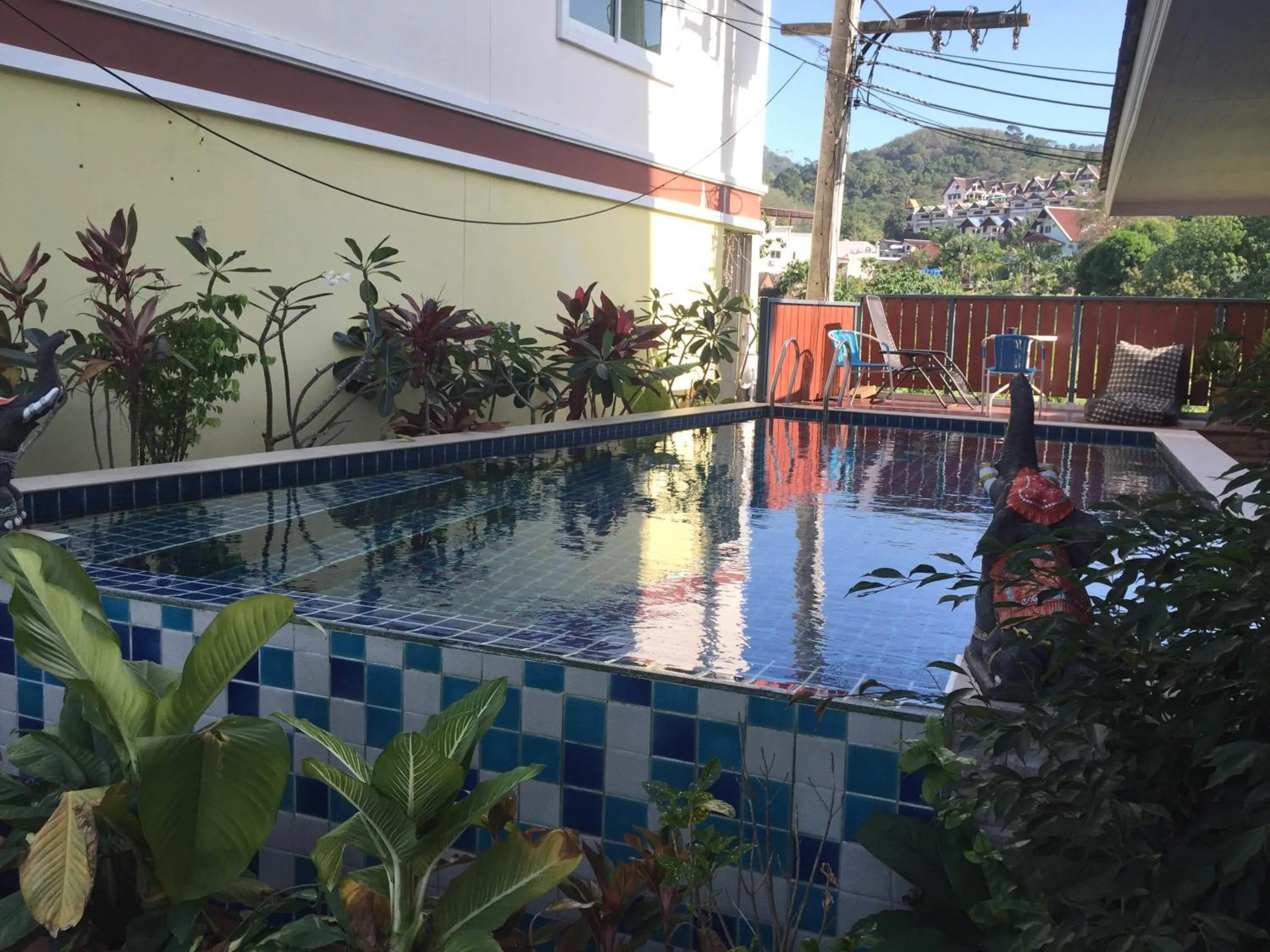Swimming pool in Green Harbor Hotel & Service Apartment