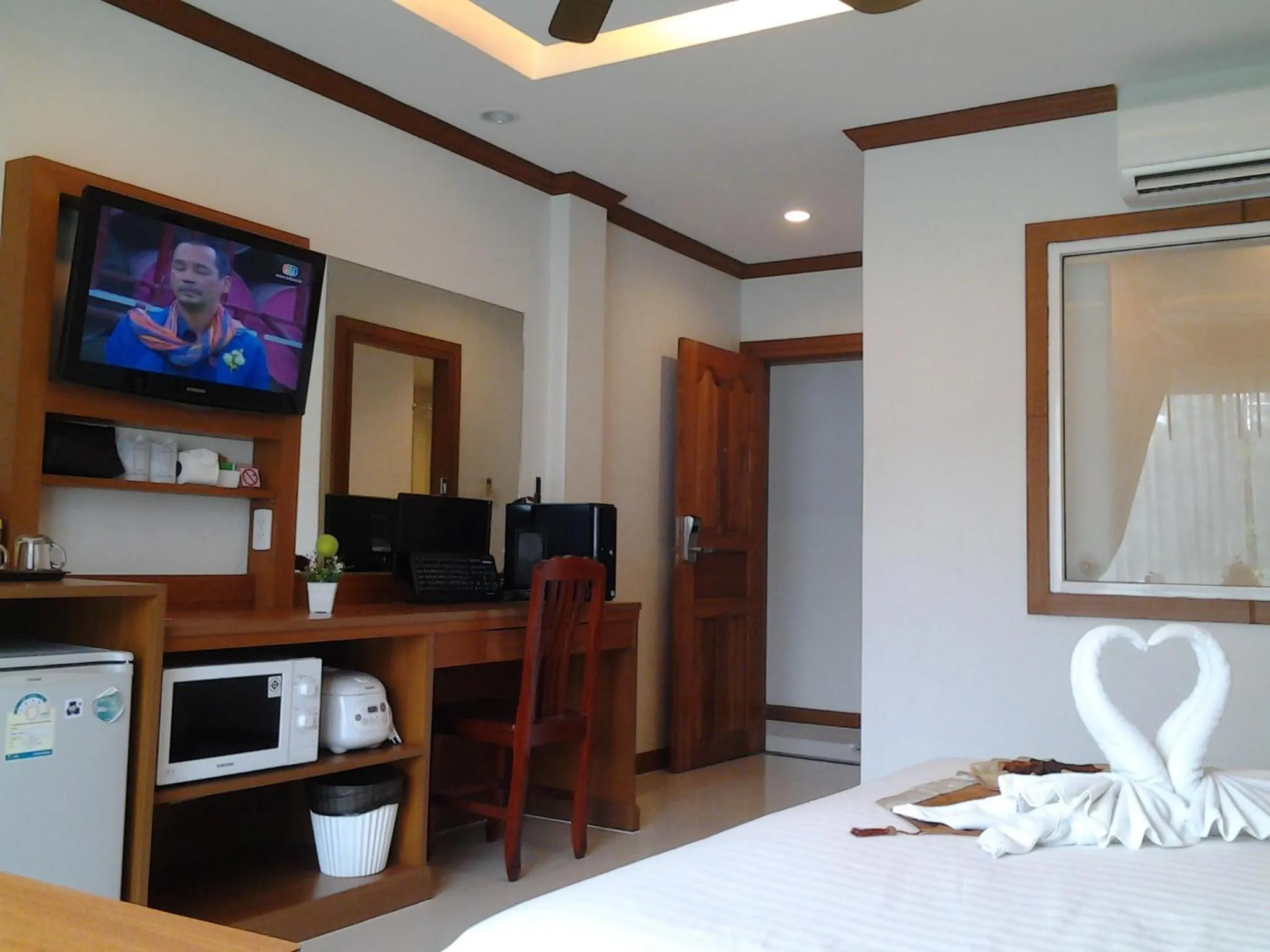 Bedroom, Bed in Green Harbor Hotel & Service Apartment