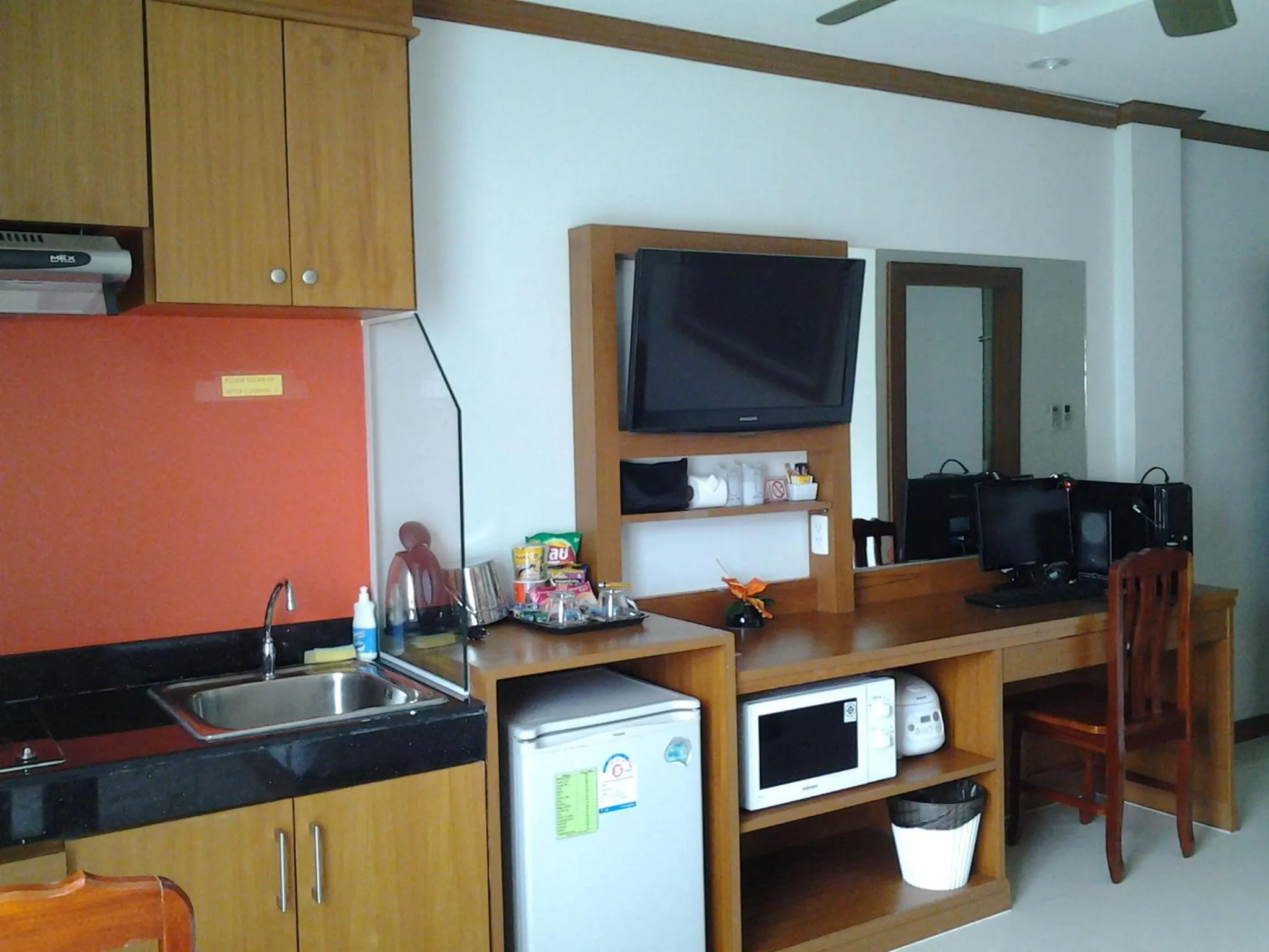 Kitchen or kitchenette in Green Harbor Hotel & Service Apartment