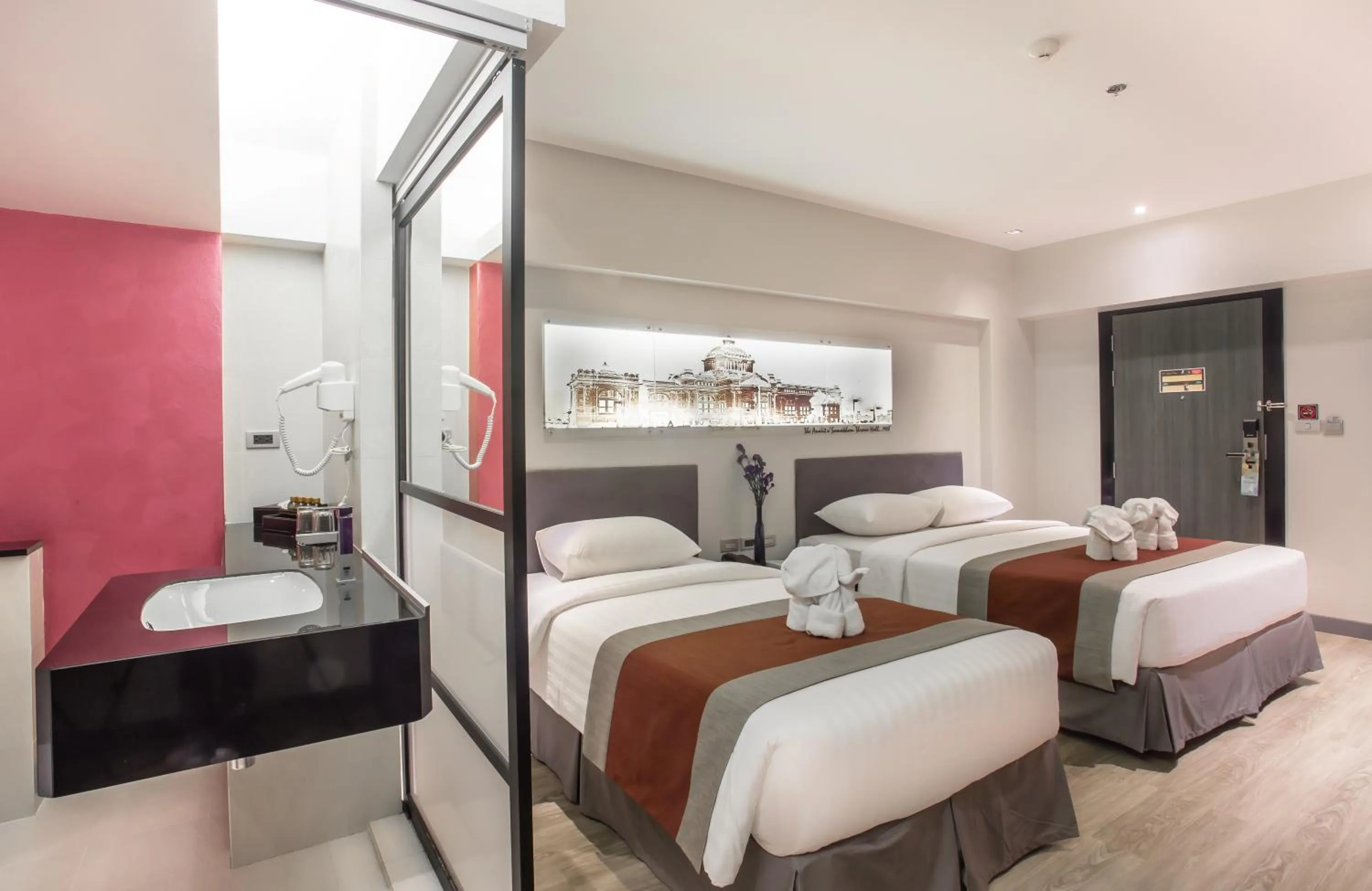 Photo of the whole room, Bed in Nouvo City Hotel