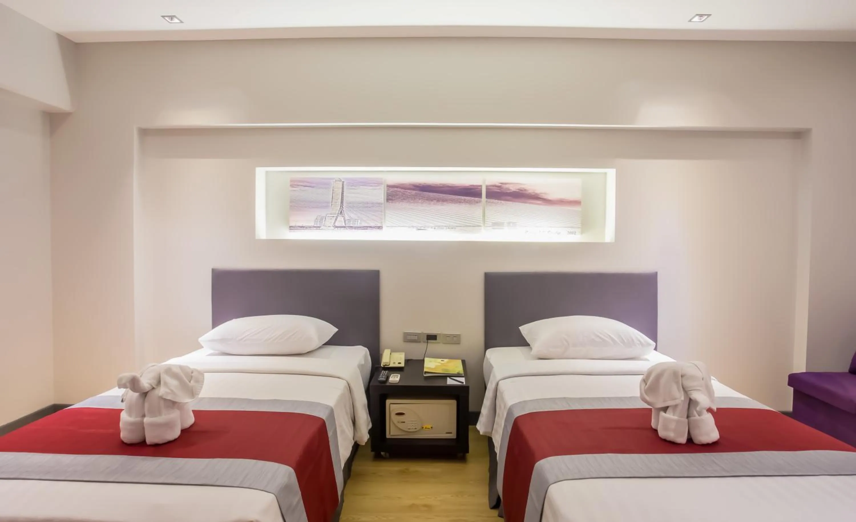 Photo of the whole room, Bed in Nouvo City Hotel