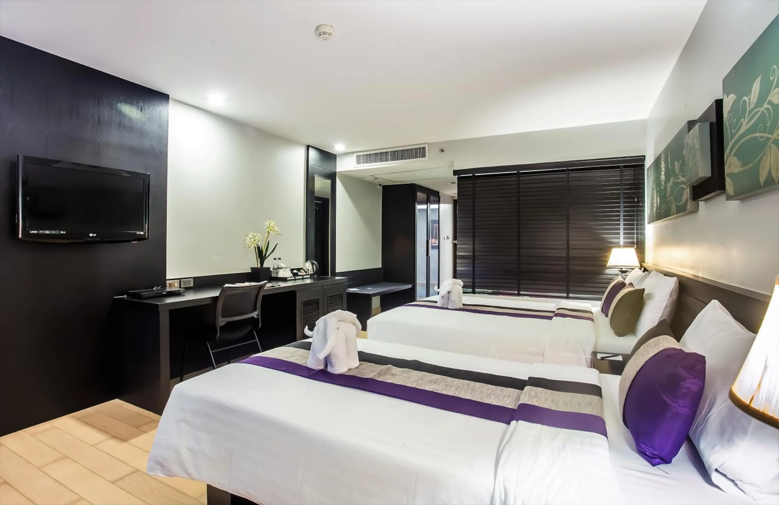 Photo of the whole room, Bed in Nouvo City Hotel