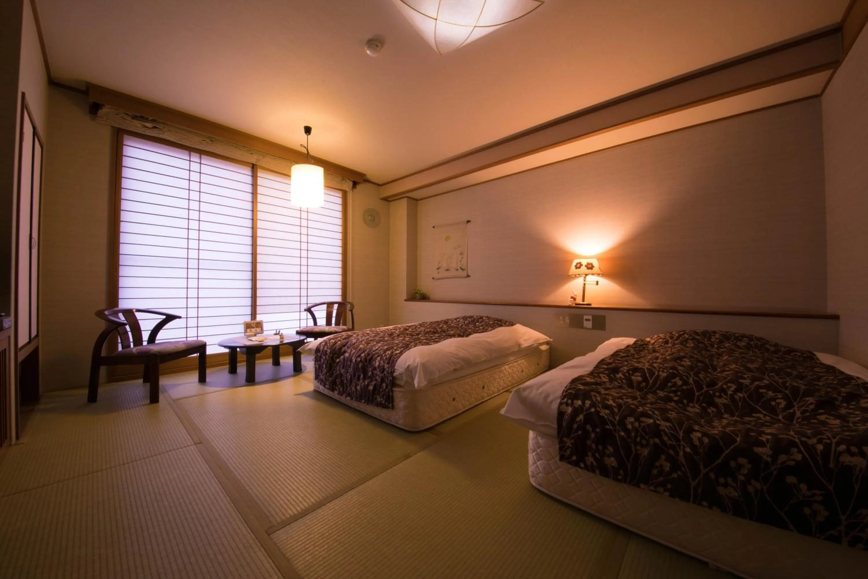 Bed in Yufuin Kaorinosato Hanamura