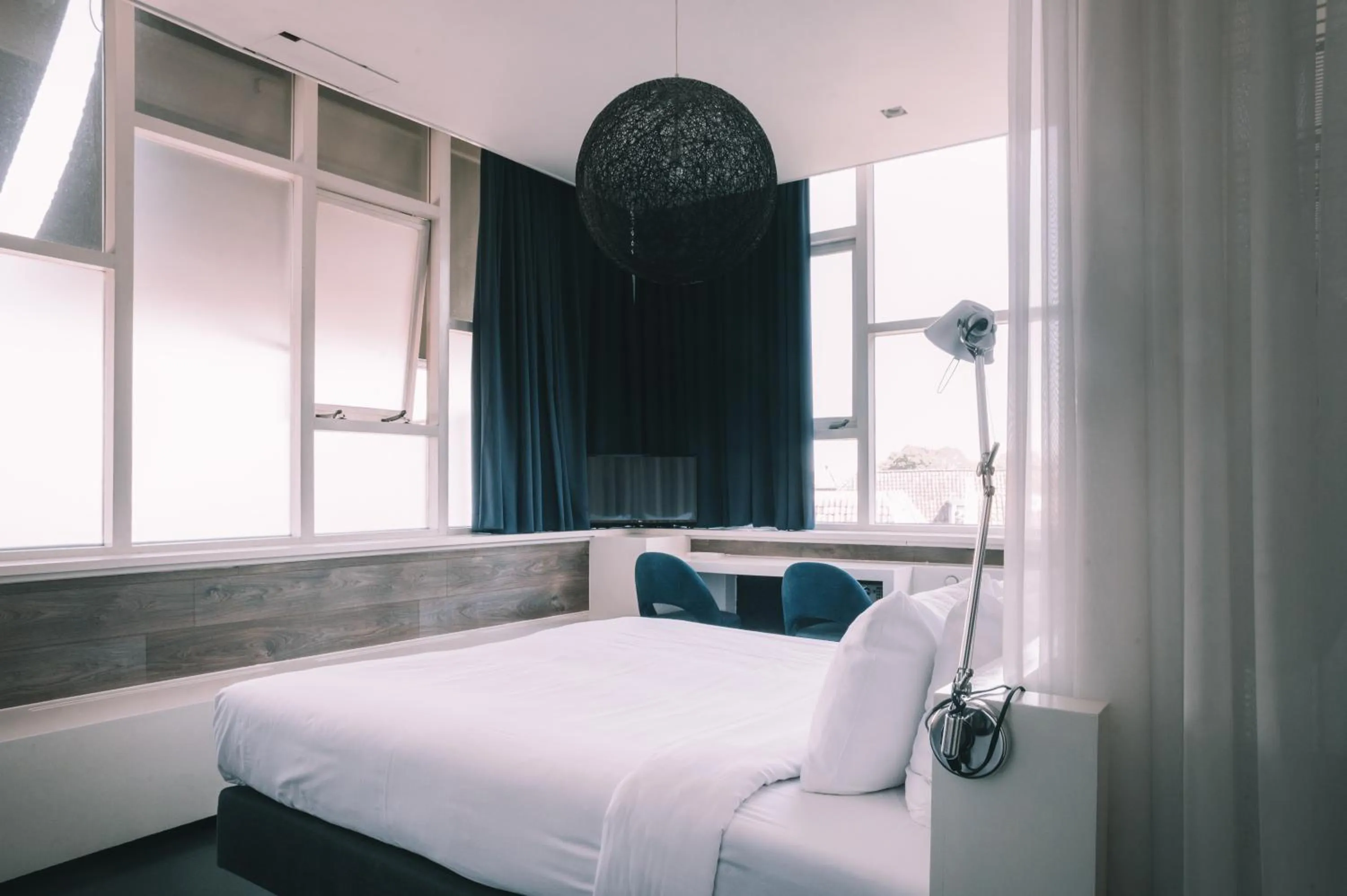 Bed in Anne&Max Boutique Hotel