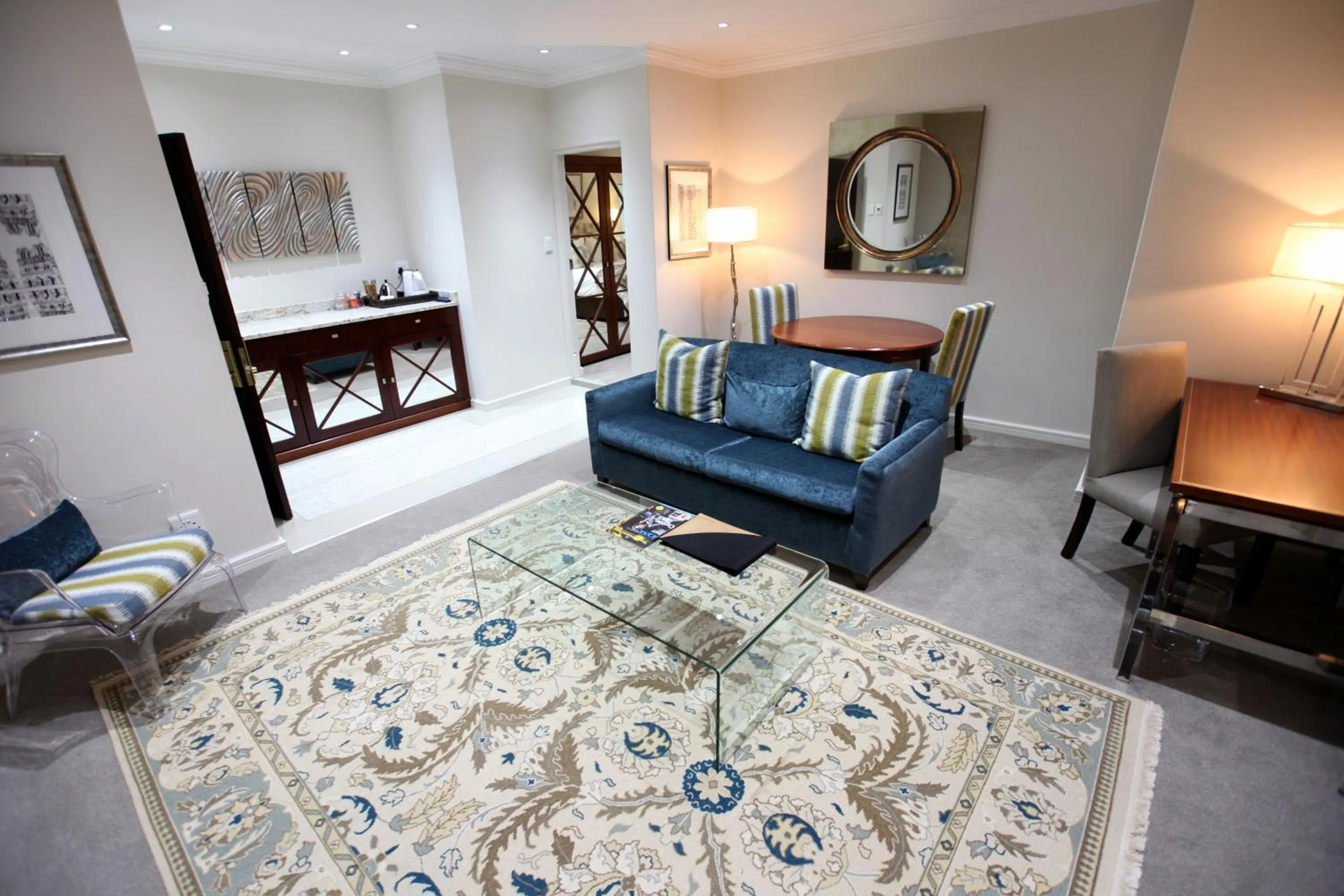 Living room, Bed in Indaba Hotel, Spa & Conference Center