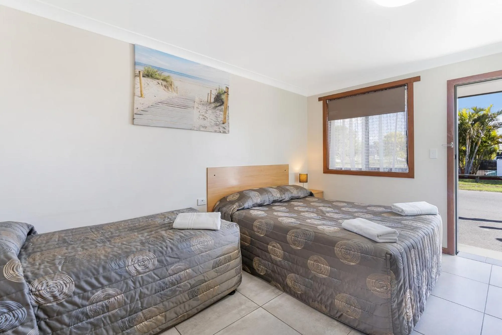 Bed in Palm Valley Motel