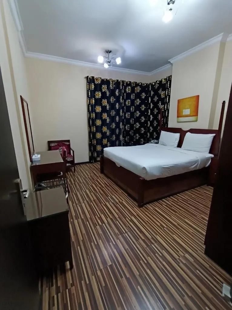 Bed in Grand PJ Hotel