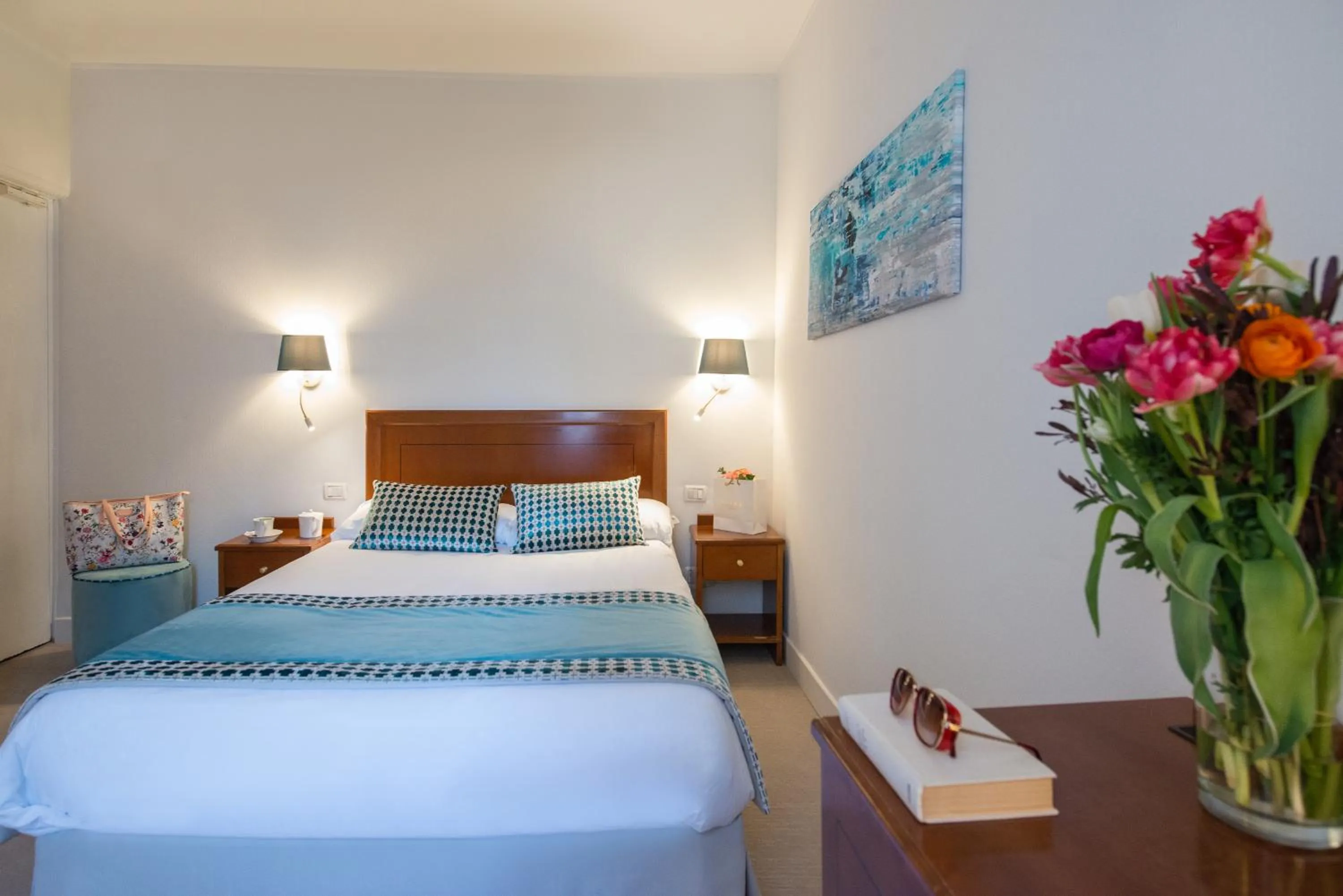 Bed in Hotel Olympia