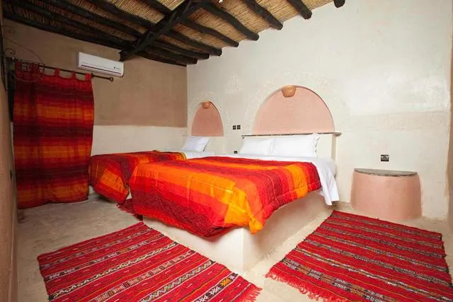 Bed in Palmeras Y Dunas Luxery Camp