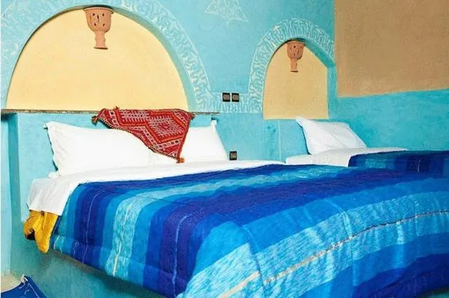 Bed in Palmeras Y Dunas Luxery Camp