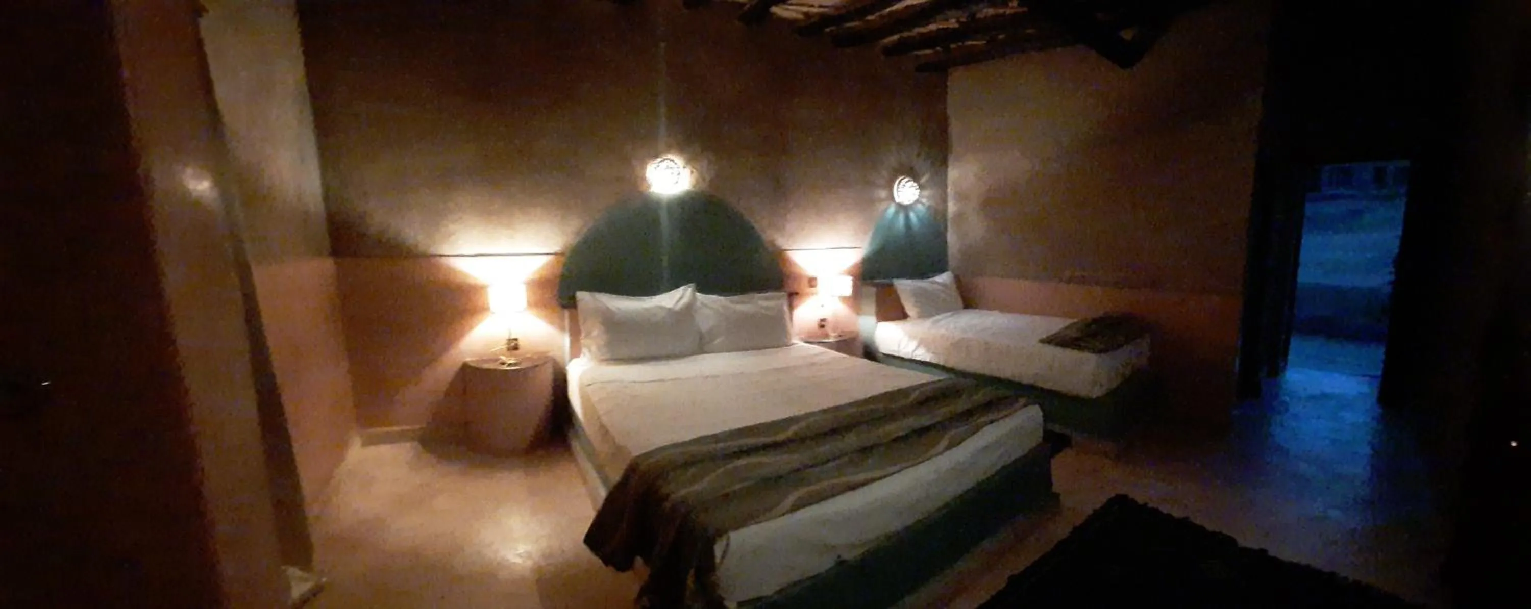 Bed in Palmeras Y Dunas Luxery Camp