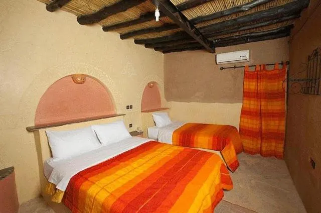 Bed in Palmeras Y Dunas Luxery Camp