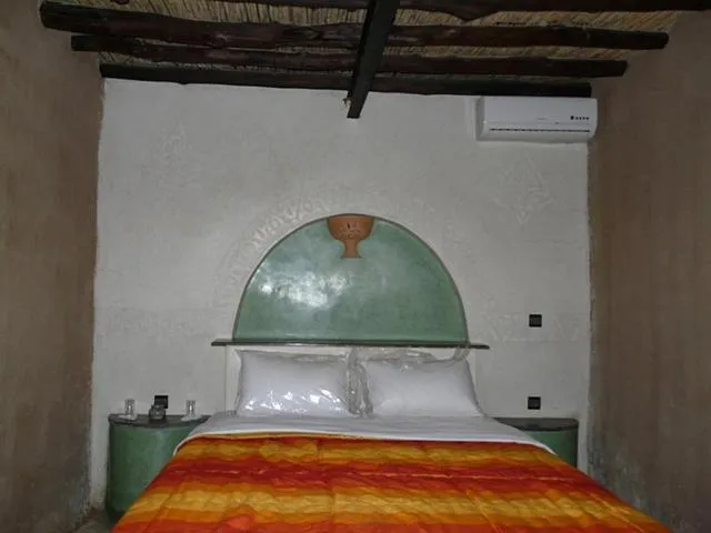 Bed in Palmeras Y Dunas Luxery Camp