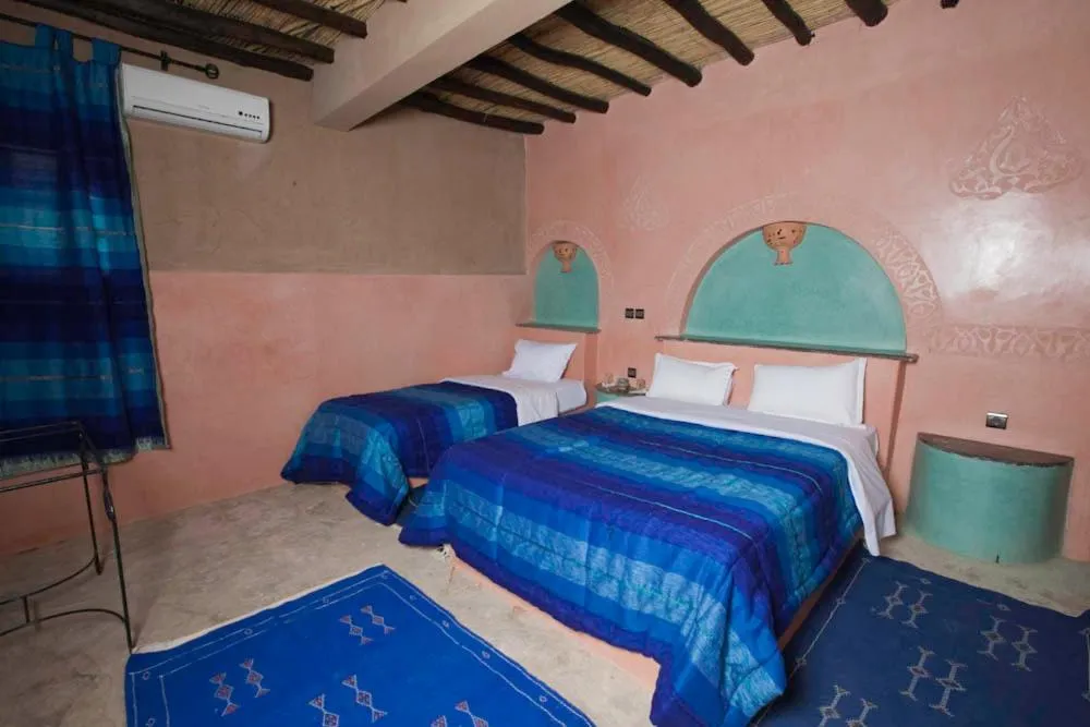 Bed in Palmeras Y Dunas Luxery Camp