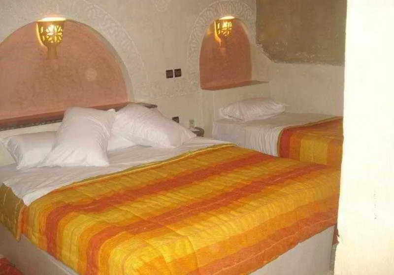 Bed in Palmeras Y Dunas Luxery Camp