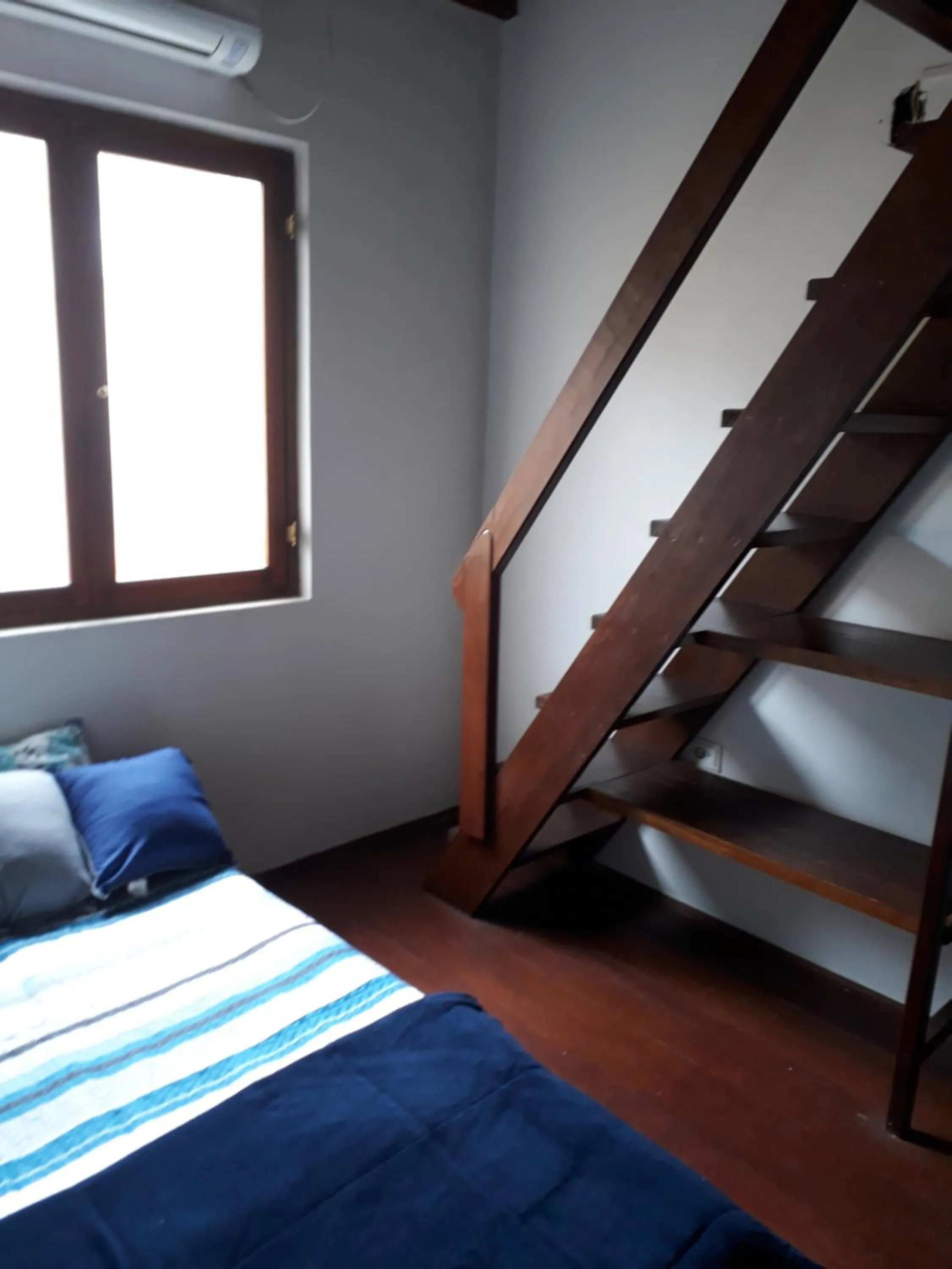 Bed in Chalé Praia Boiçucanga wi fi piscina Village Mirante Litoral Norte SP