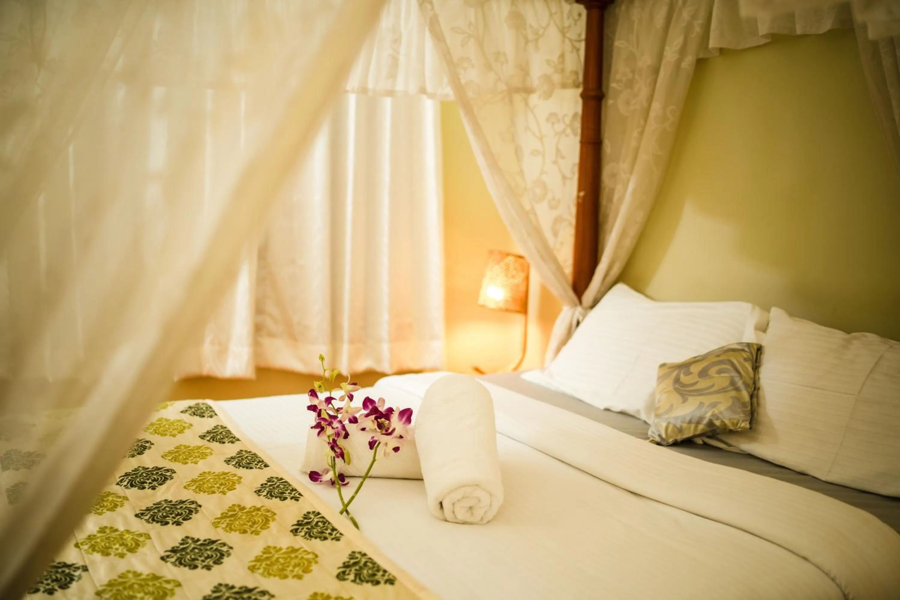 Bed in Leoney Resort Goa