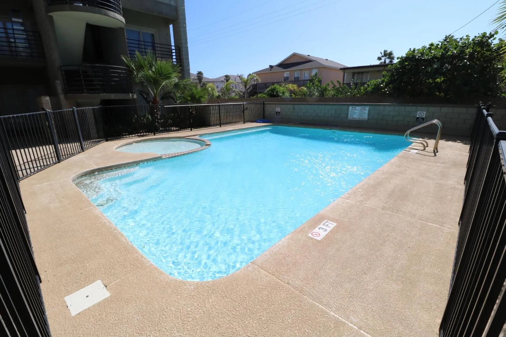 Swimming pool in The Dunes Condominiums by Cheap Getaway