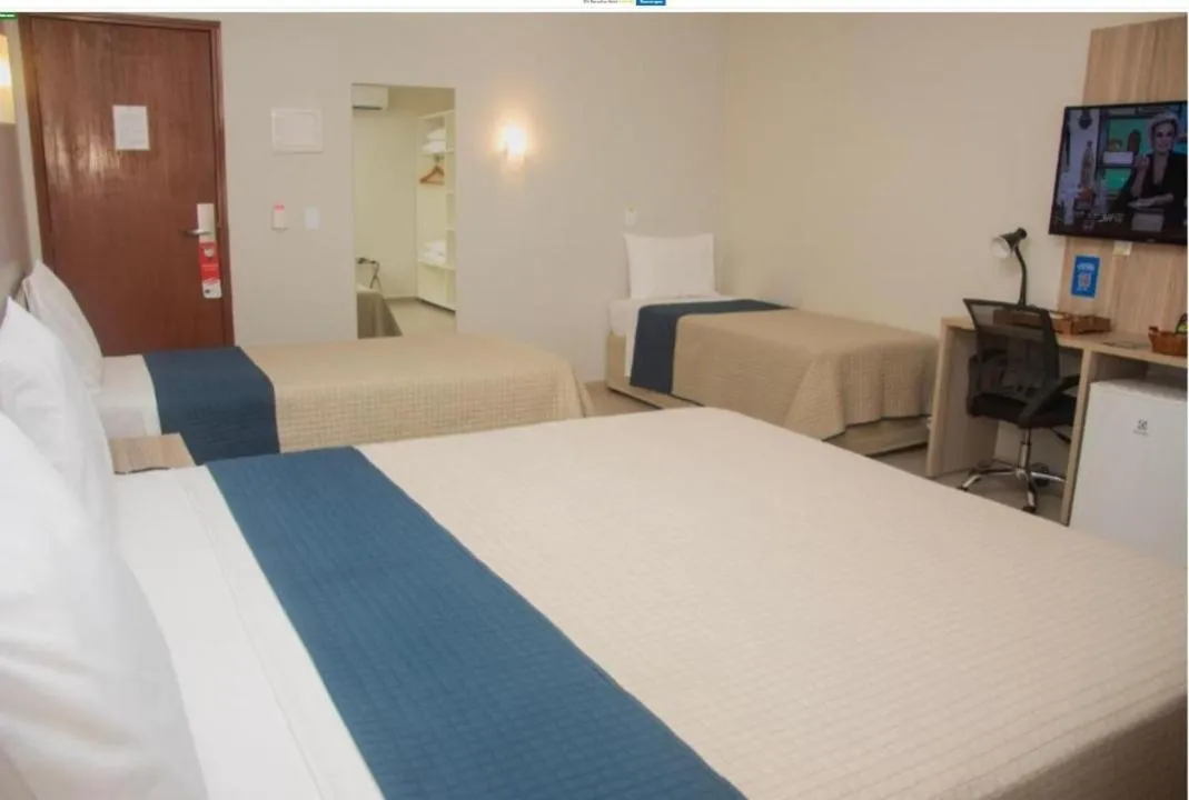 Bed in Citi Executivo Hotel