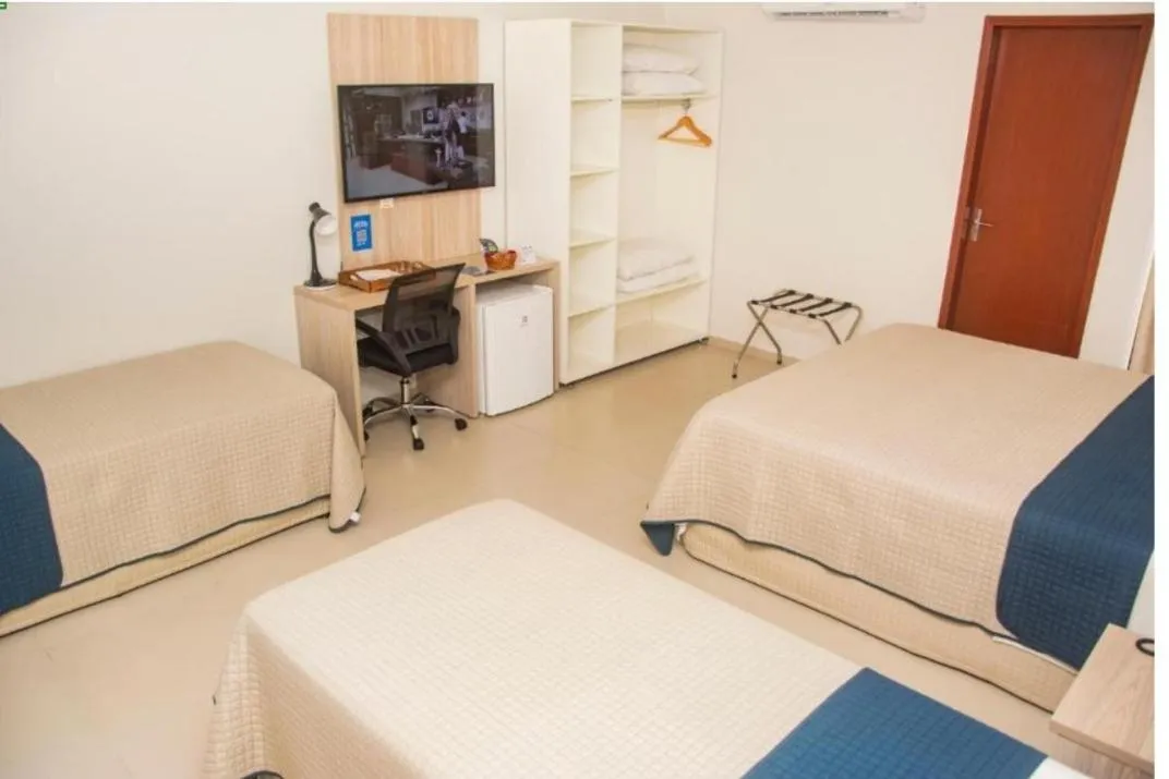 Bed in Citi Executivo Hotel