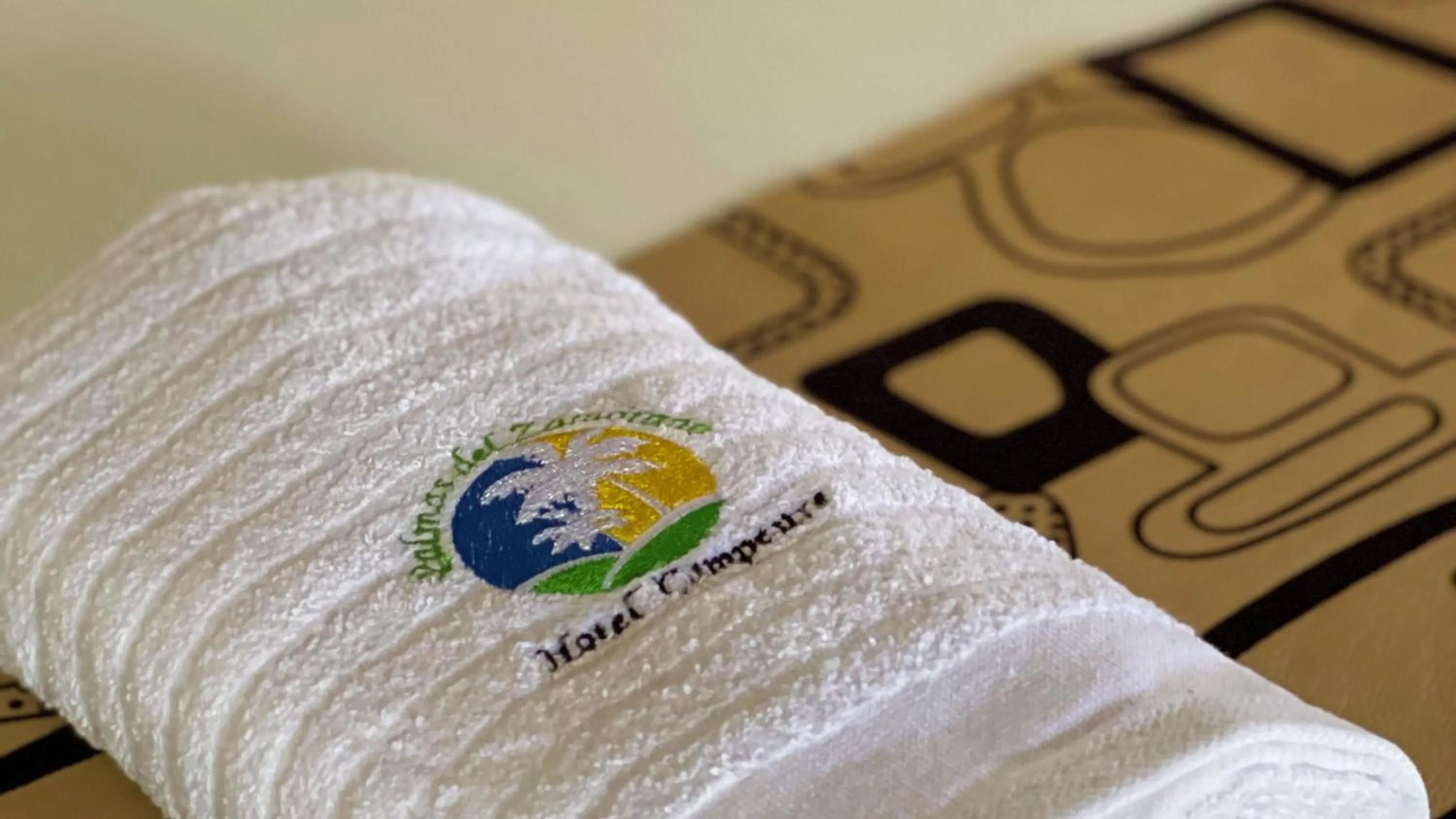 Logo/Certificate/Sign in Hotel Campestre Palmas del Zamorano