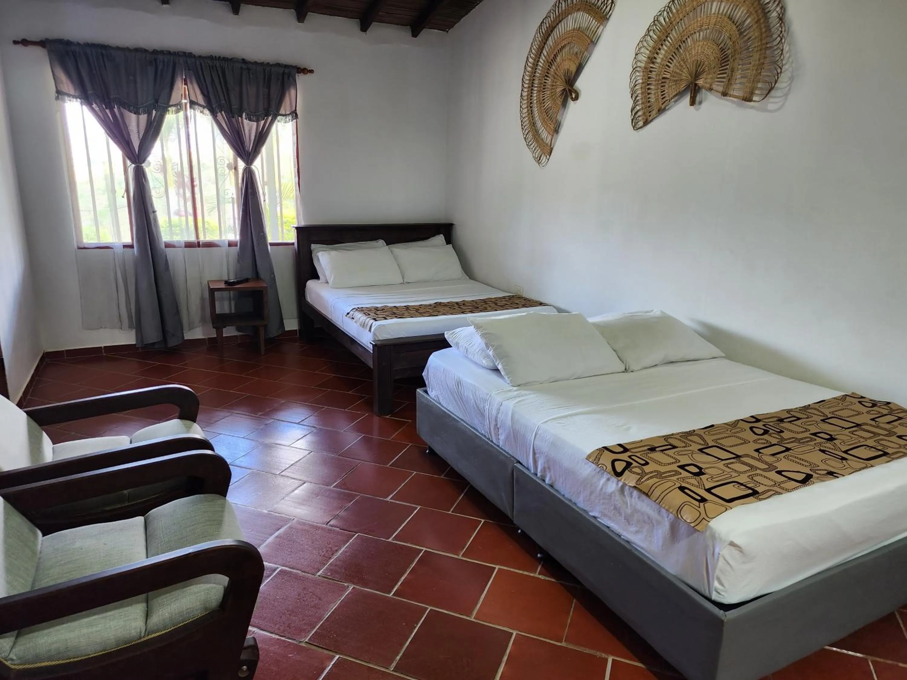 Photo of the whole room, Bed in Hotel Campestre Palmas del Zamorano