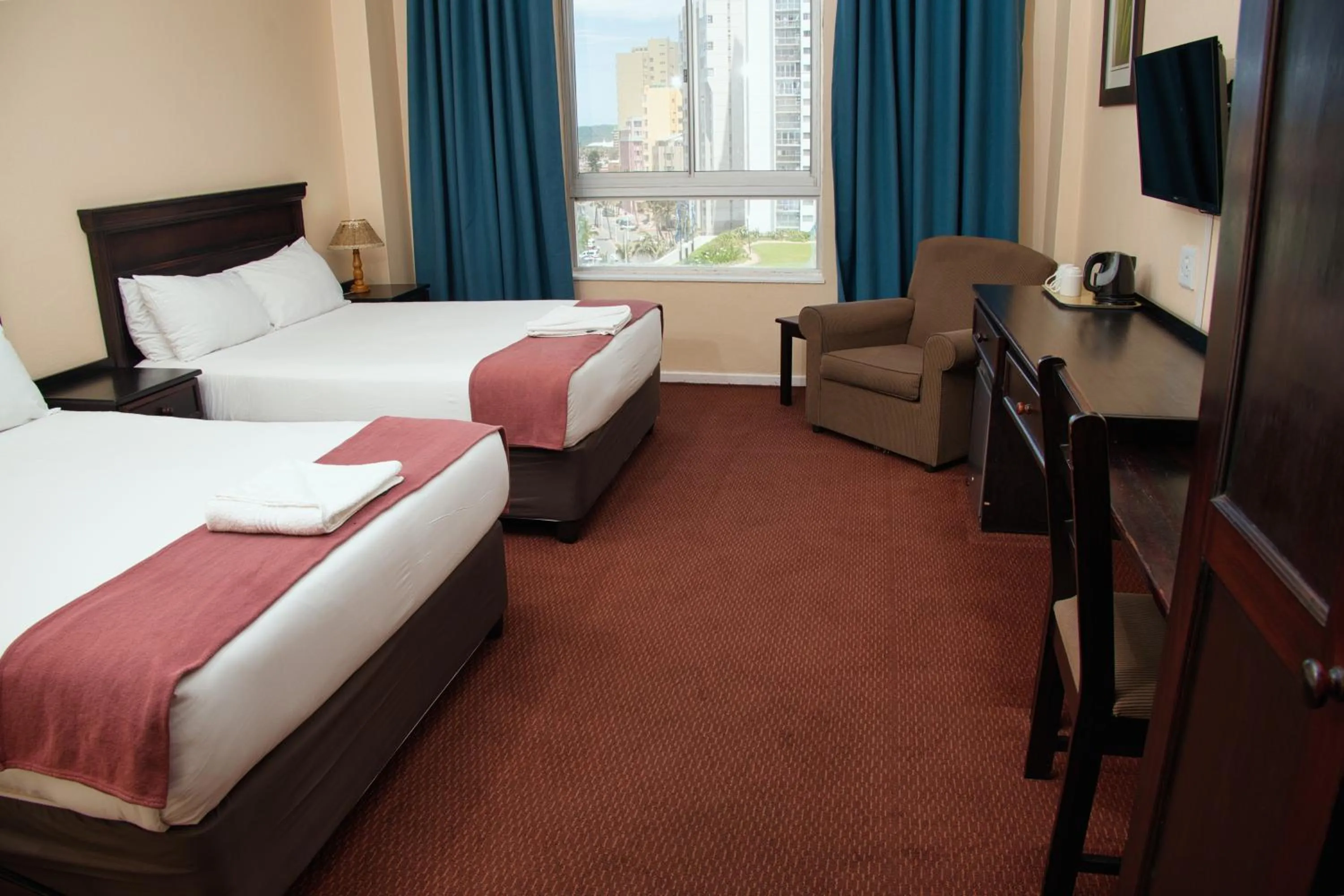 Bed in Gooderson Tropicana Hotel