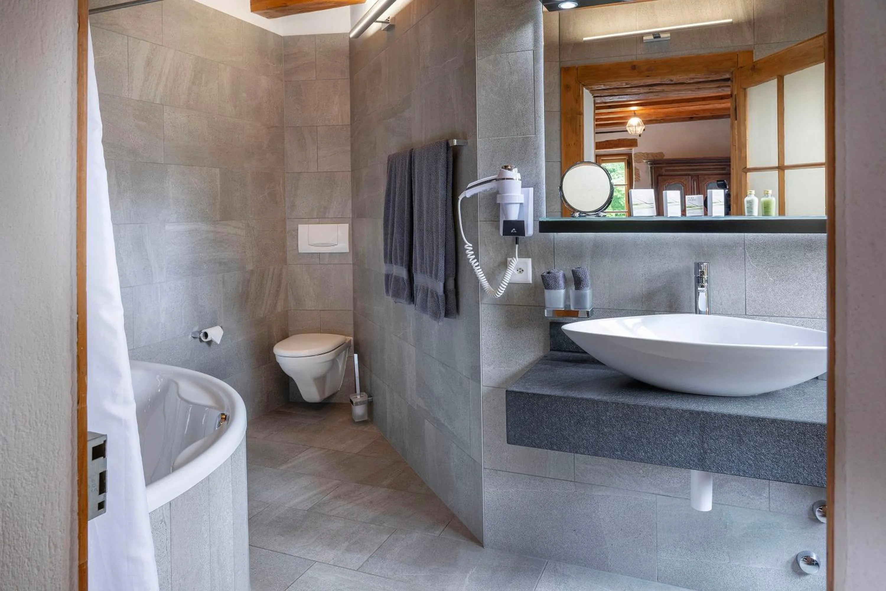 Bathroom in Hôtel La Maison du Prussien